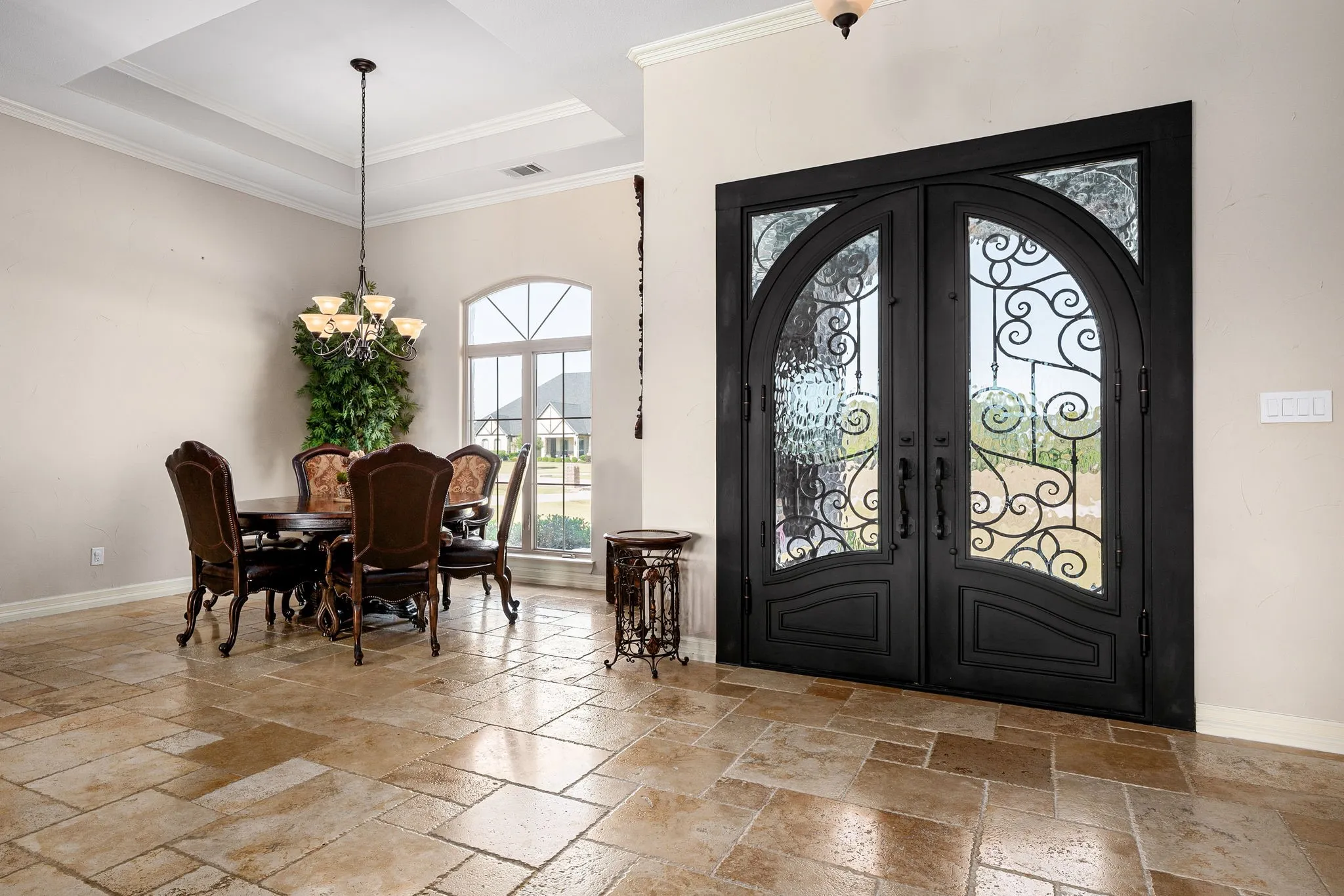 Foyer with iron doors,
