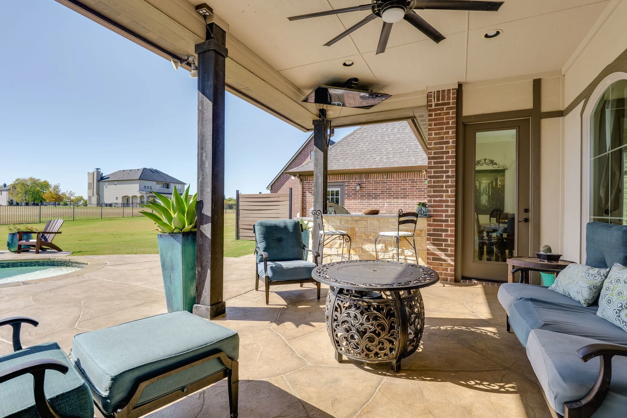 View of patio featuring a ceiling fan and an outdoor hangout area