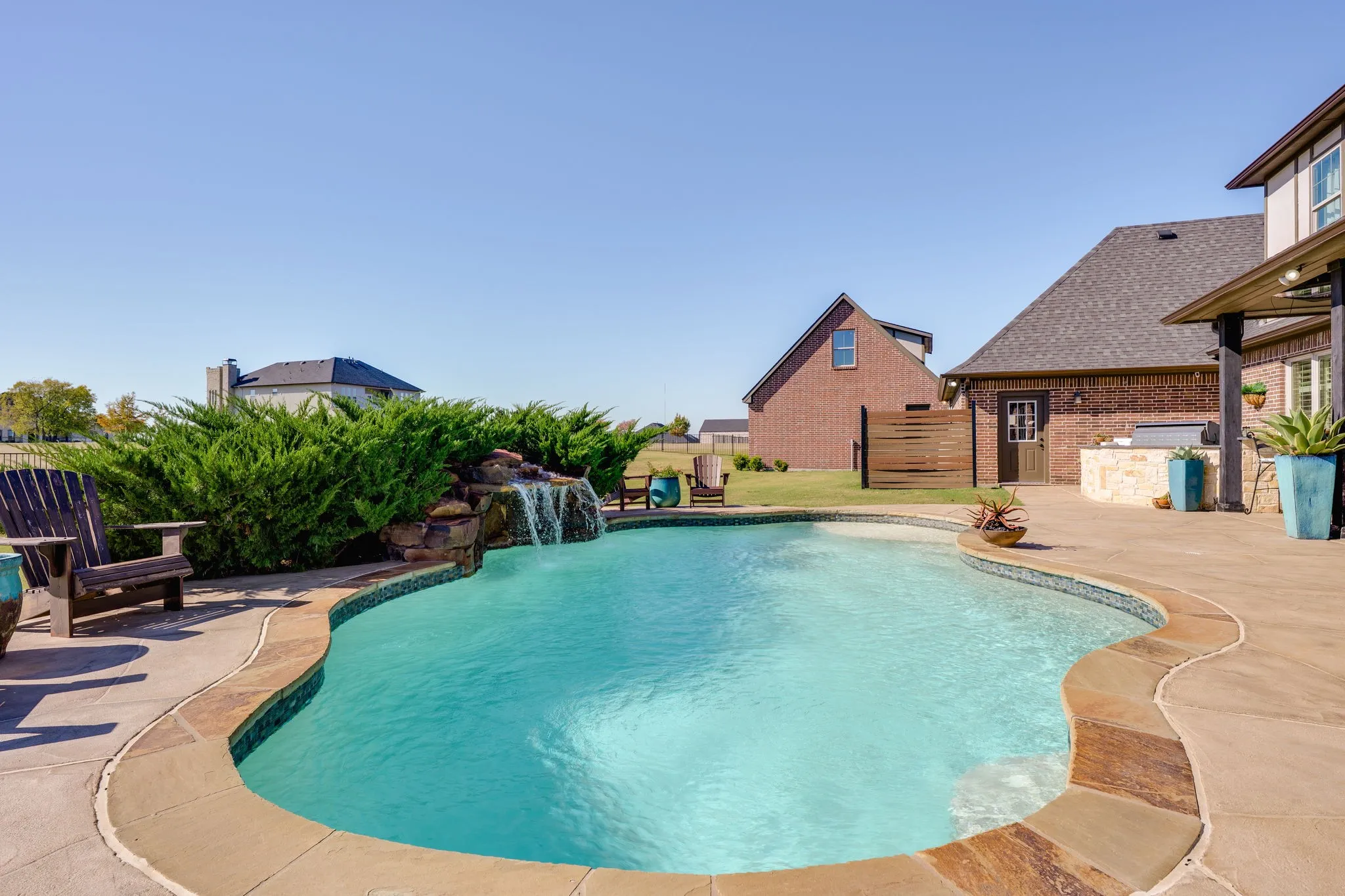 Swimming pool with a patio
