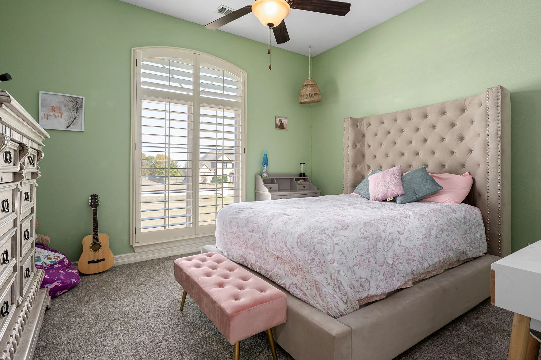 Bedroom with carpet flooring and ceiling fan