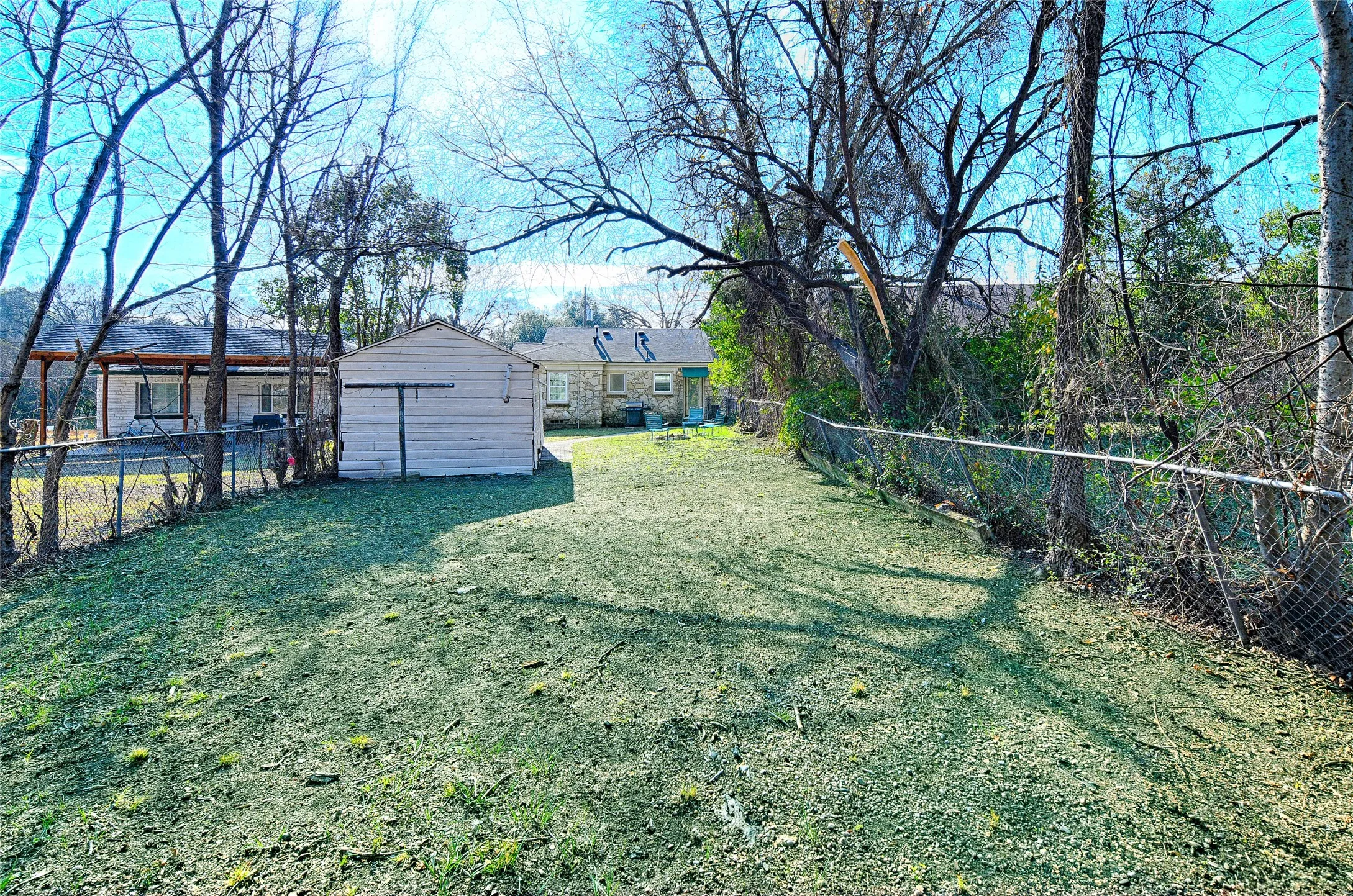 Fenced backyard and garage