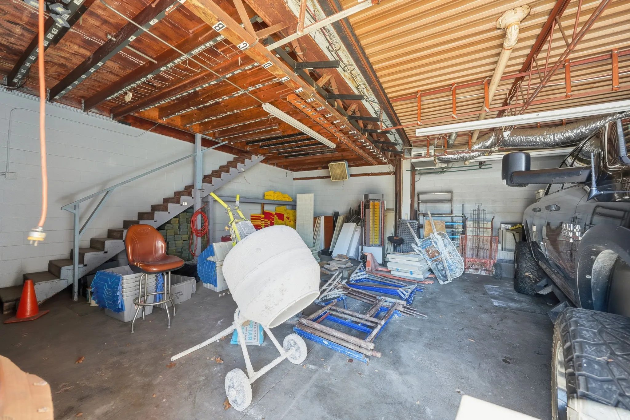 Exposed-truss ceilings add character and height