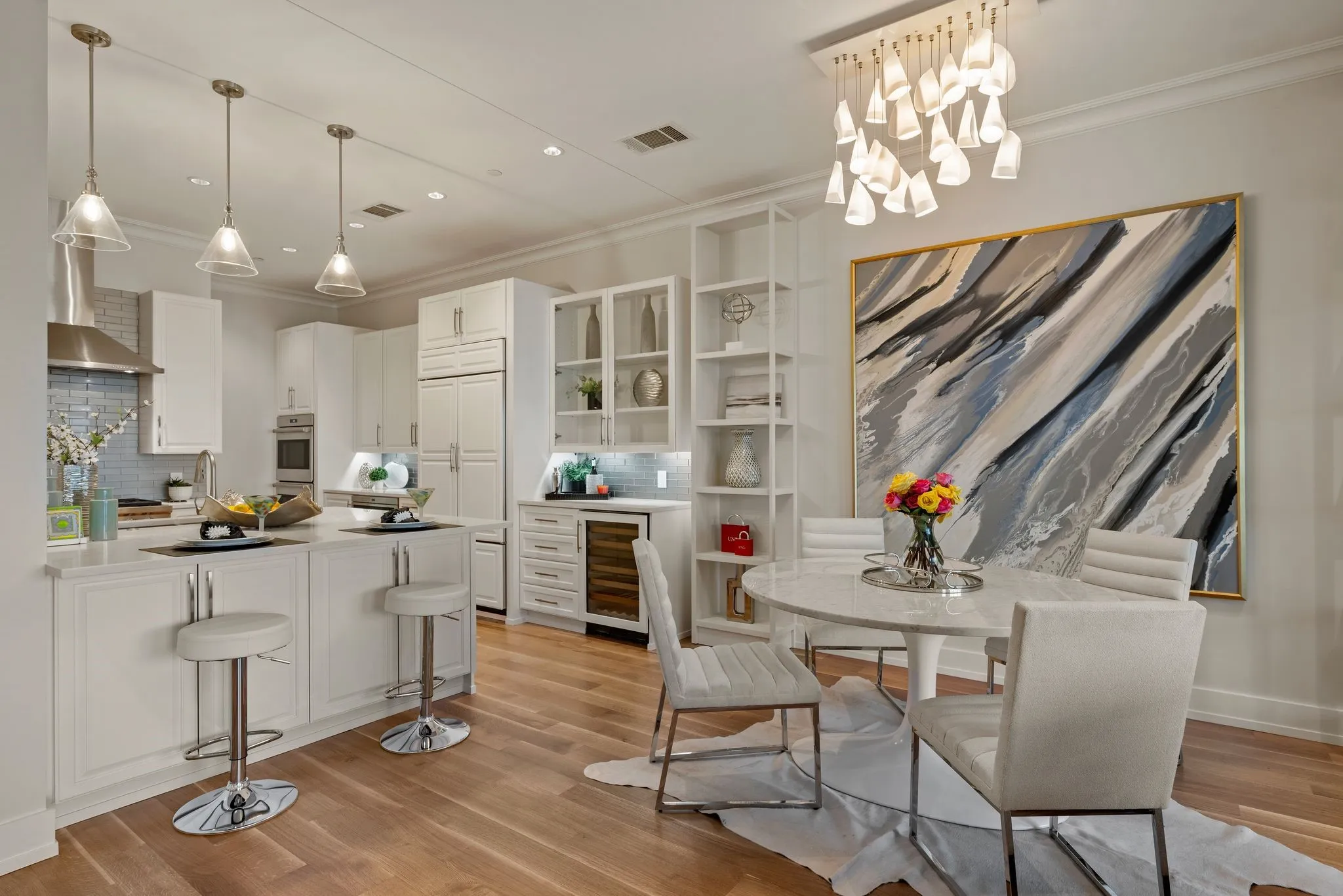 Dining area with wine refrigerator, recessed lighting, light wood finished floors, and ornamental molding