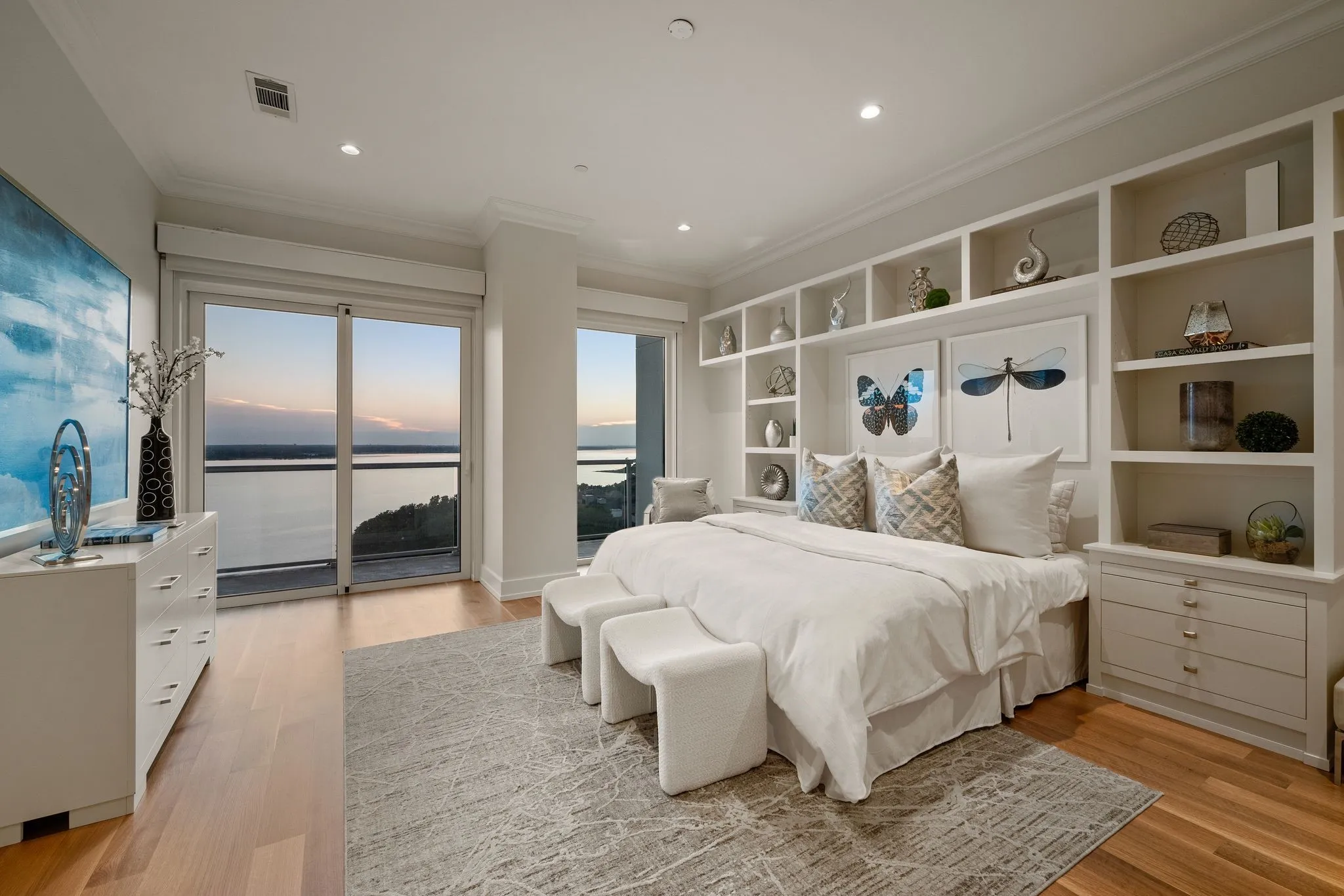 Bedroom with ornamental molding, access to exterior, and light wood-style floors