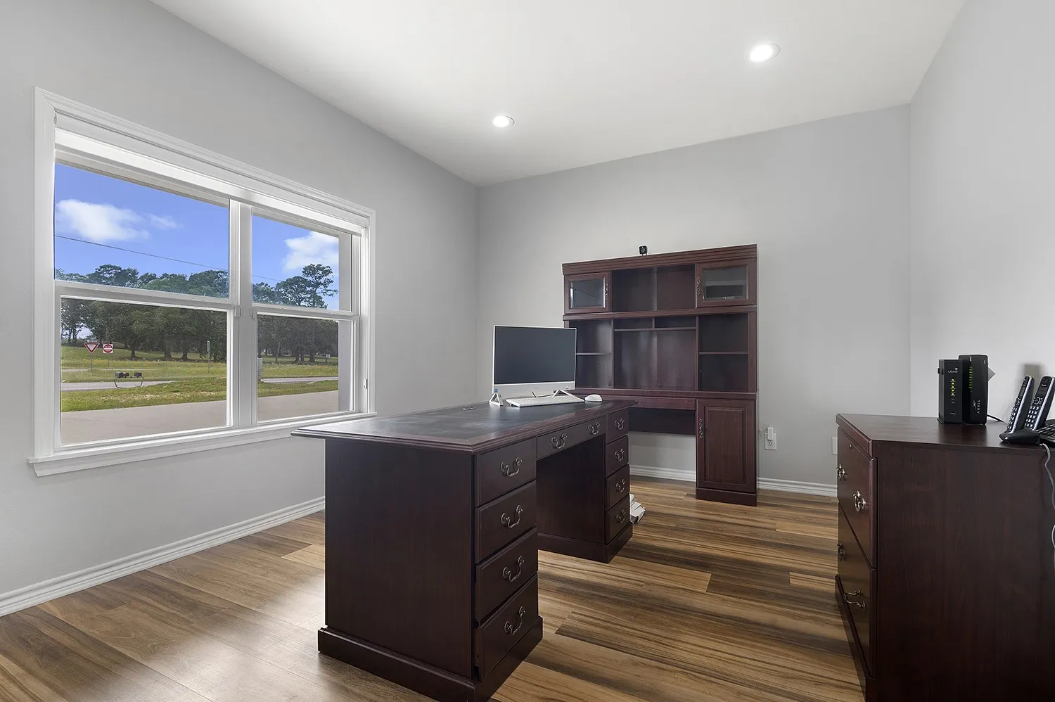 Office 1- featuring dark wood-style flooring and recessed lighting