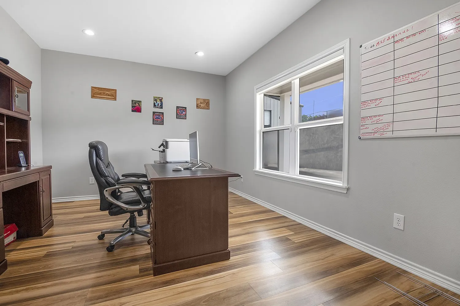 Office 2 featuring wood finished floors and recessed lighting