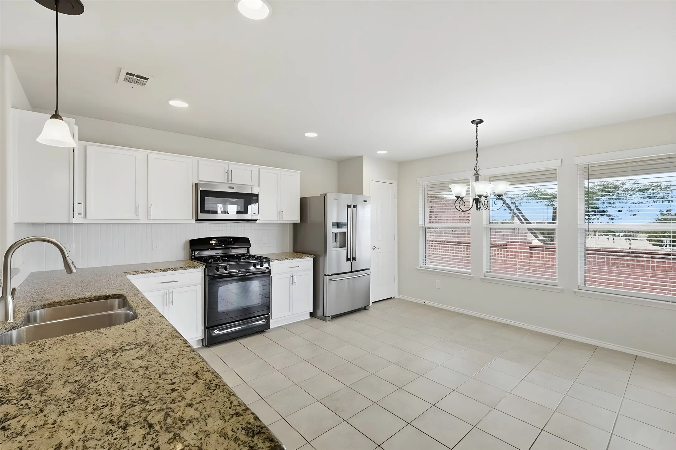 Kitchen with Dual Sinks and Granite Counters