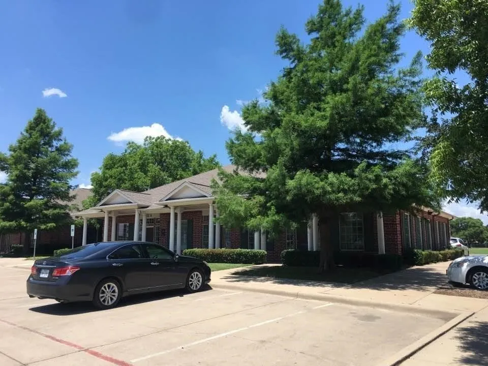Parking in front, side and back of office building.