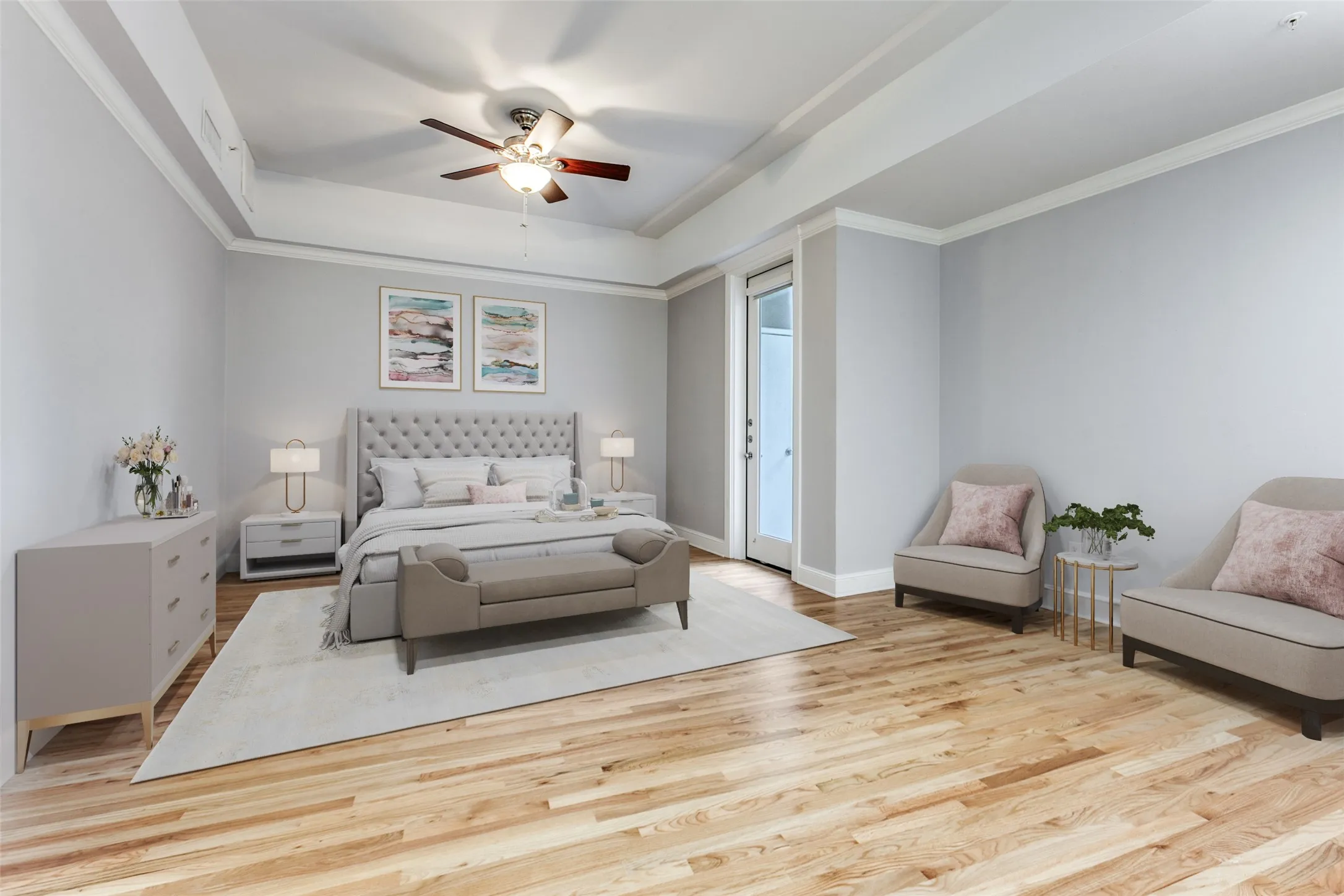 Virtually Staged primary bedroom with sitting area. Door to patio