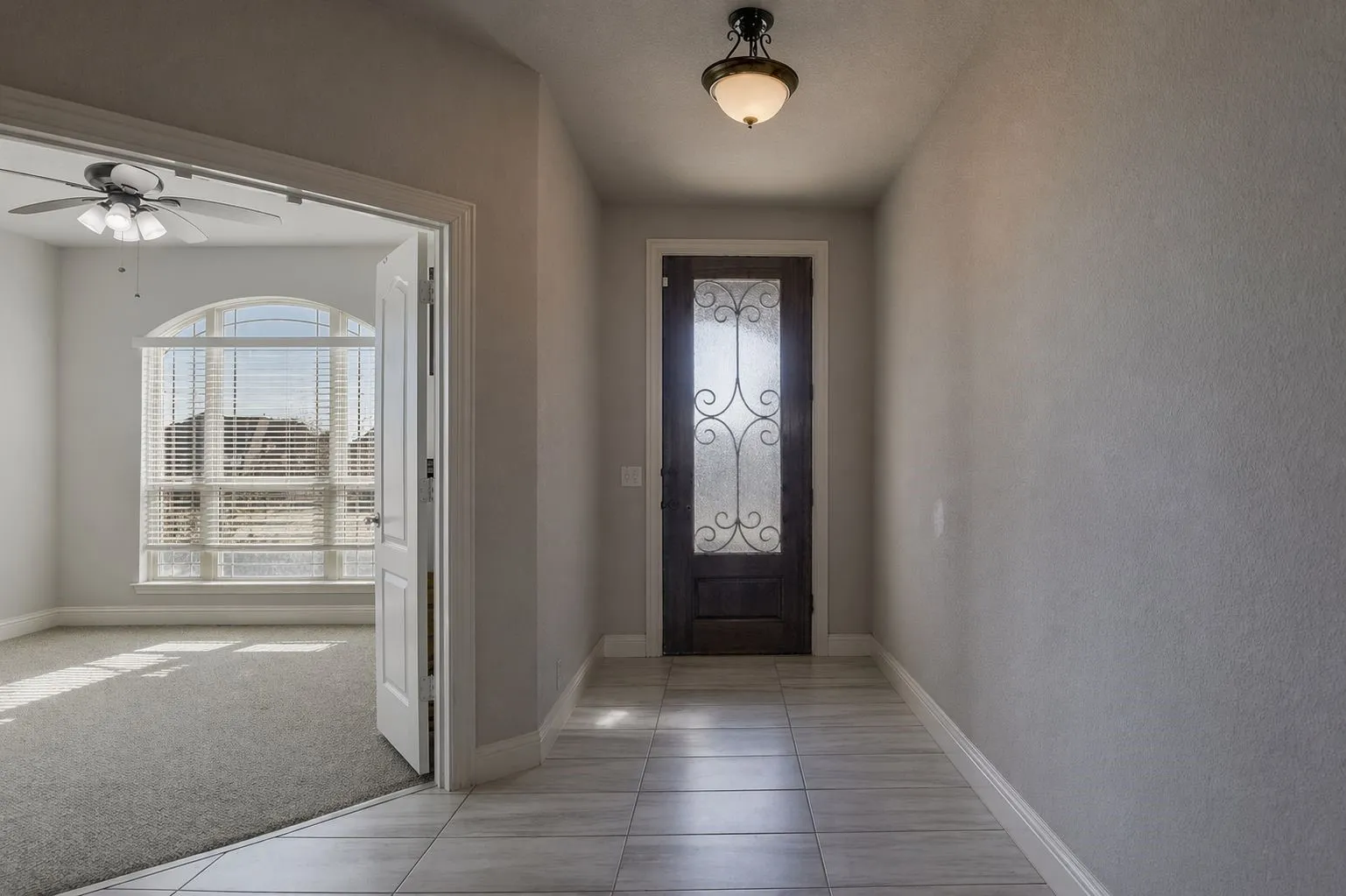 Just inside you'll find an office...or is it a bedroom? With the double French doors and a full closet, it could be either!
