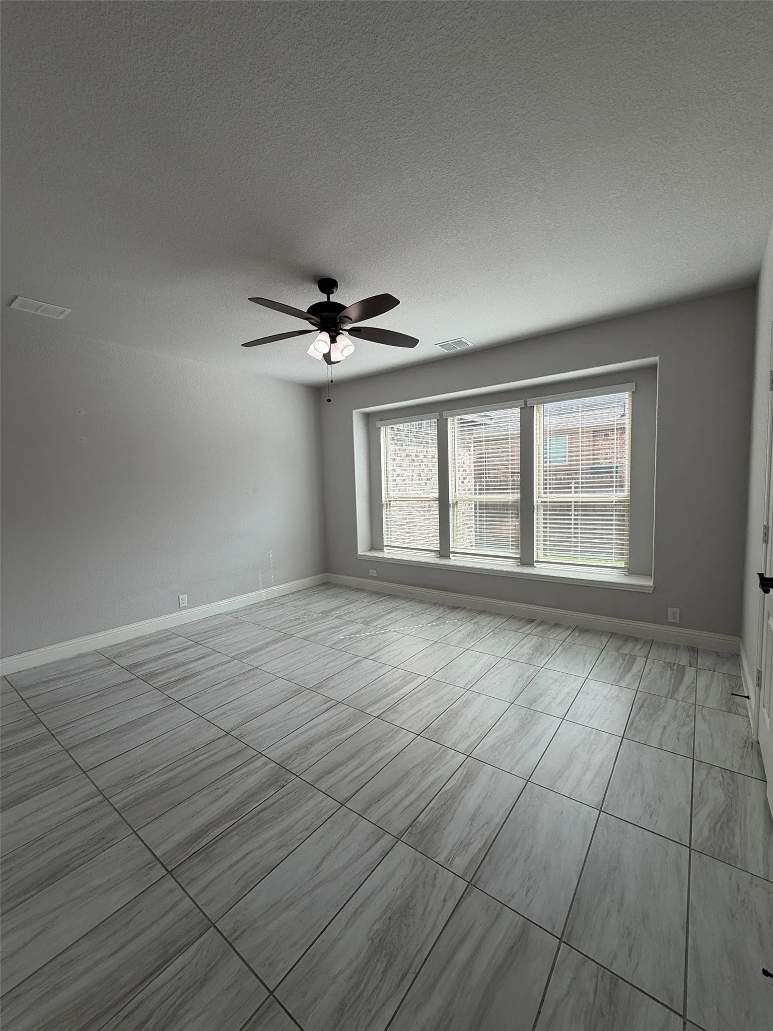 This is ONE of TWO PRIMARY BEDROOMS with an ENSUITE bathroom. Wow!