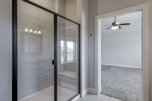 You guessed it! That's another difference...an extended walk-in shower with a built-in bench.