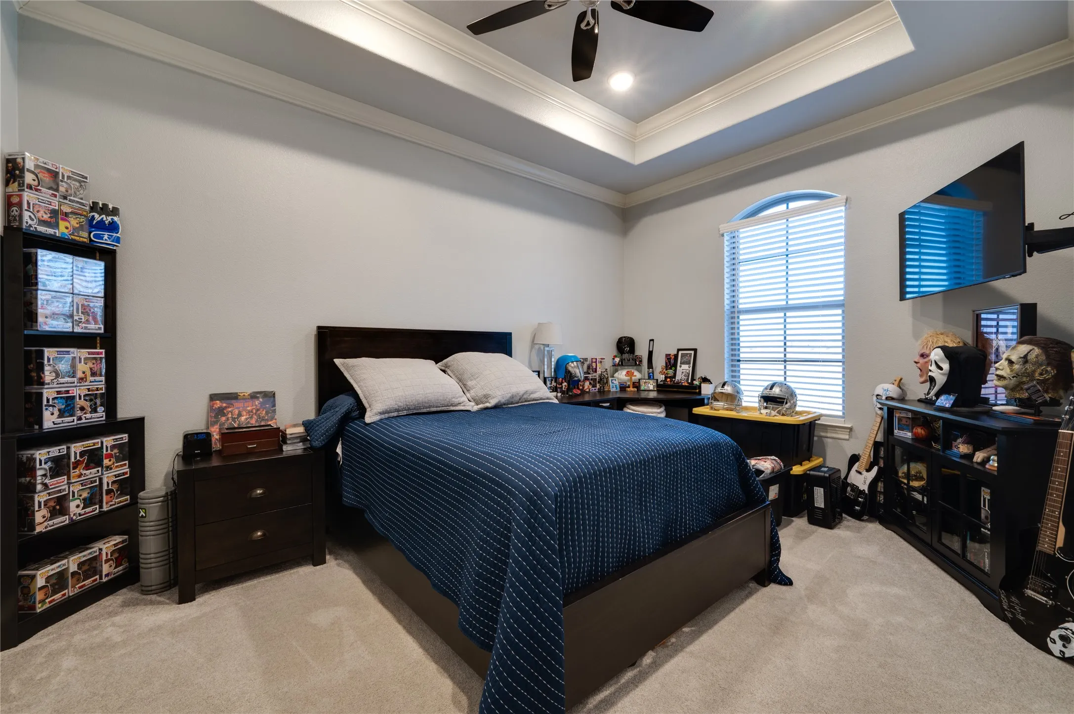 3rd Bedroom with tray ceilings and walk in closet.