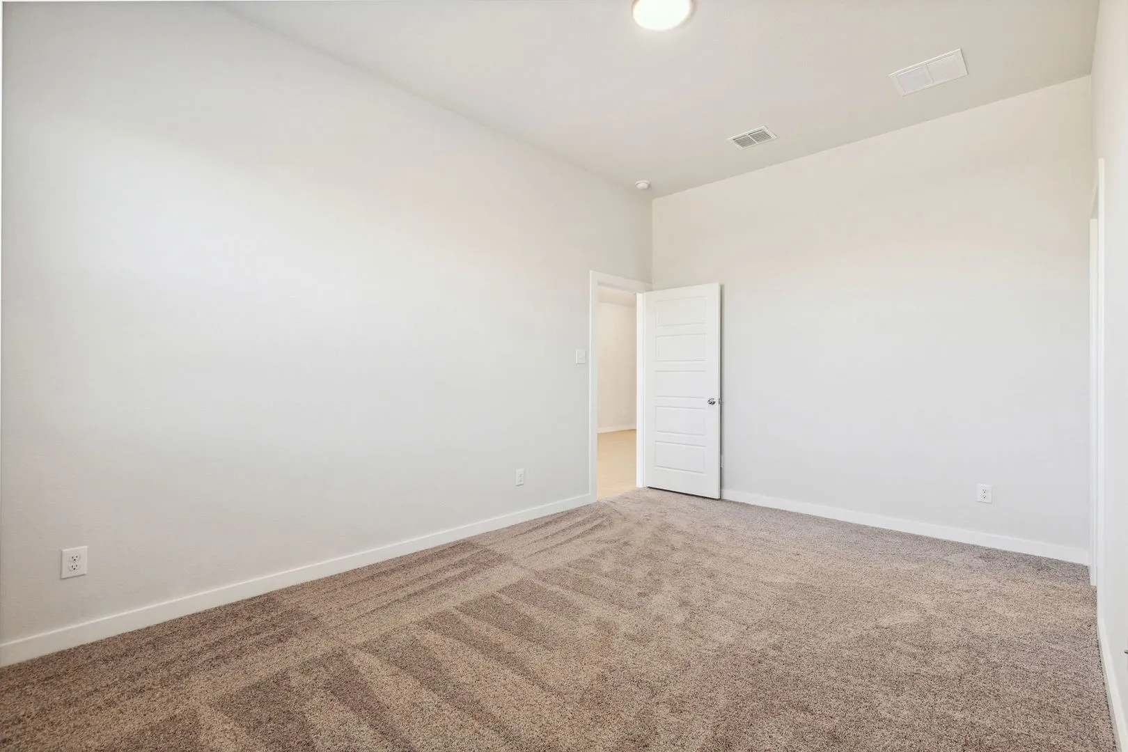 Primary Suite in the Ash home plan by Trophy Signature Homes – REPRESENTATIVE PHOTO
