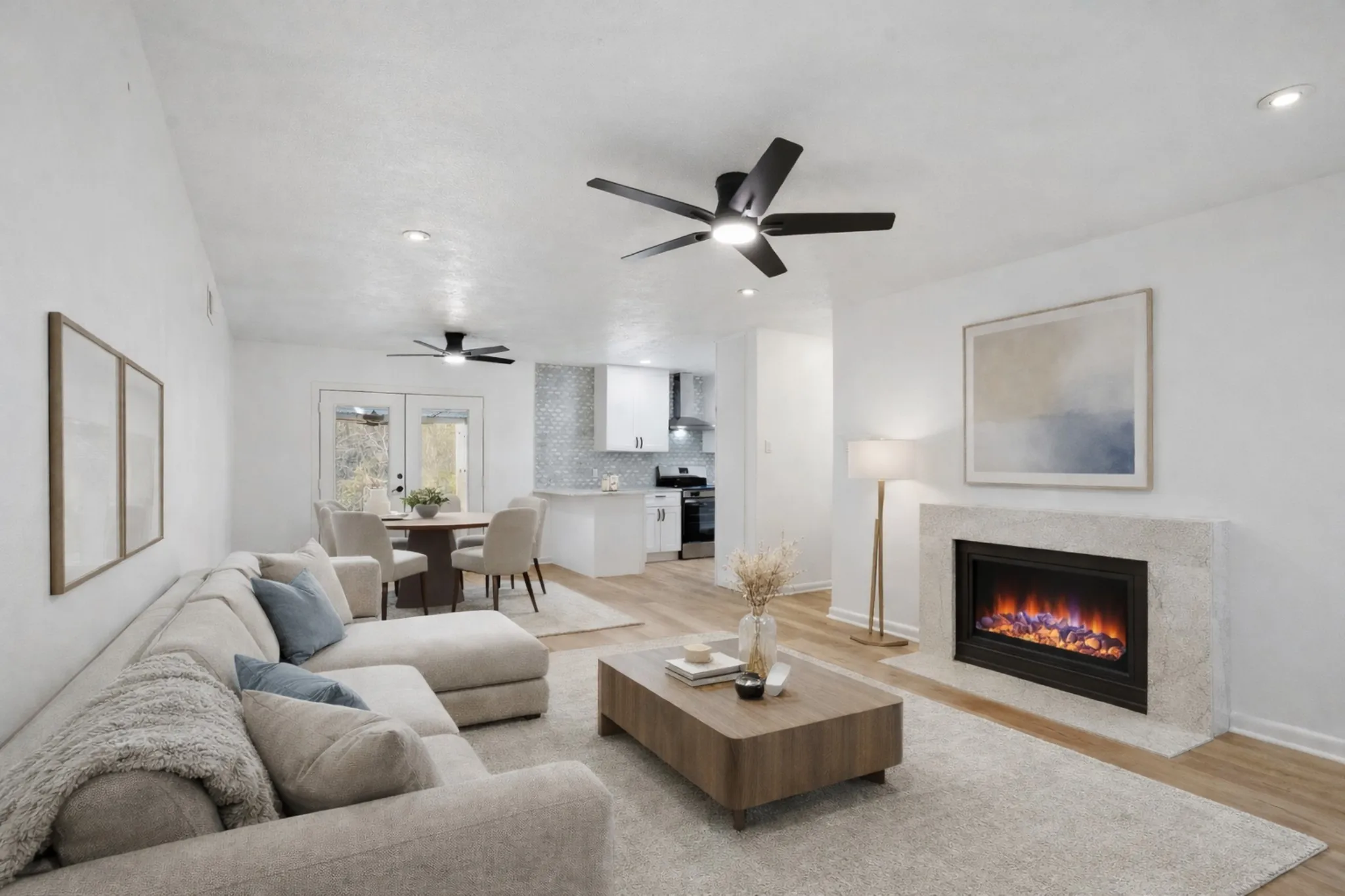 Virtual Staged Living Room & Dining Area with Virtual Electric Fireplace