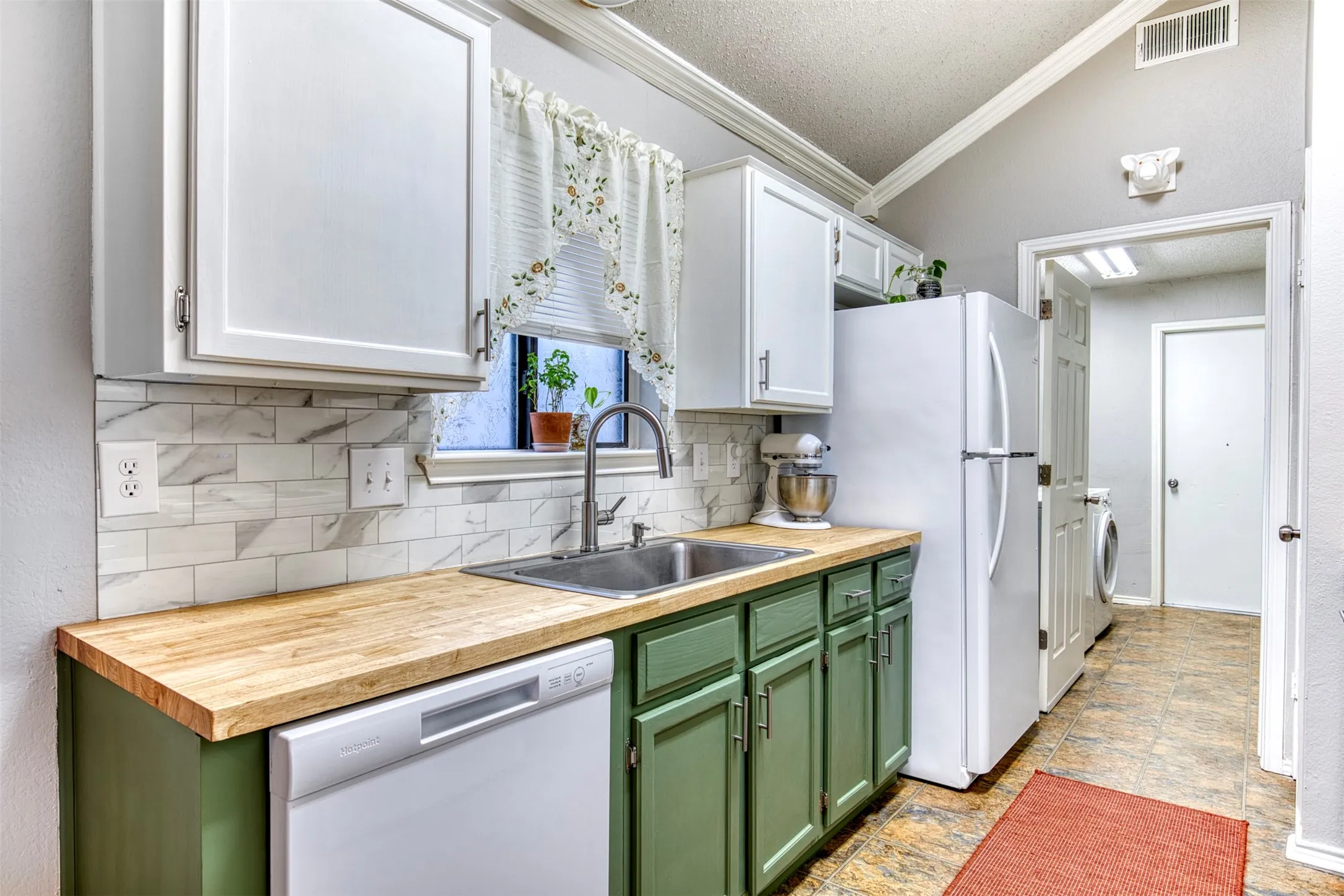 fresh cabinets and butcher block counters