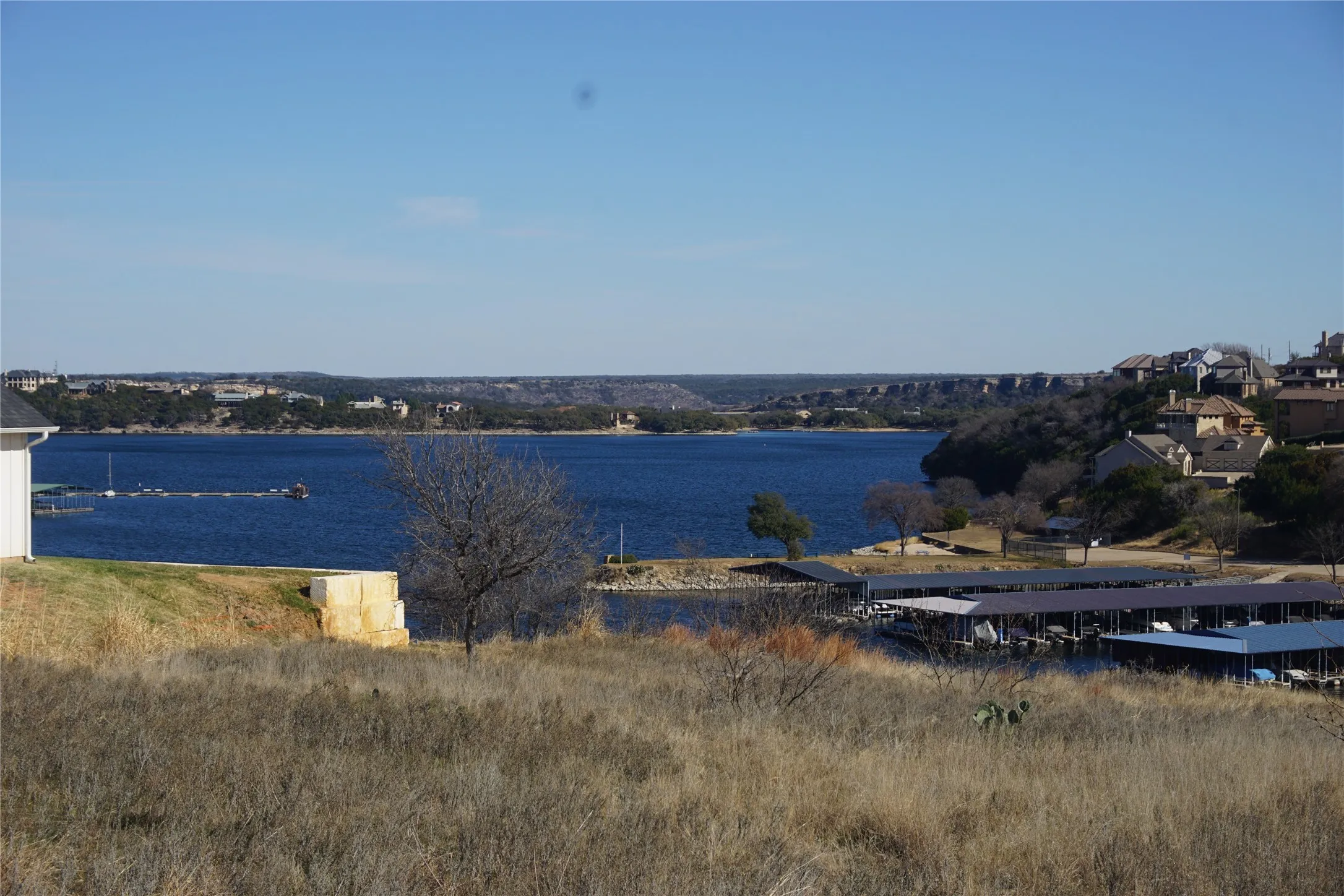 A view (from a vacant lot across the street from Lot 55) of the quiet waters leading into the Cliffs Marina.