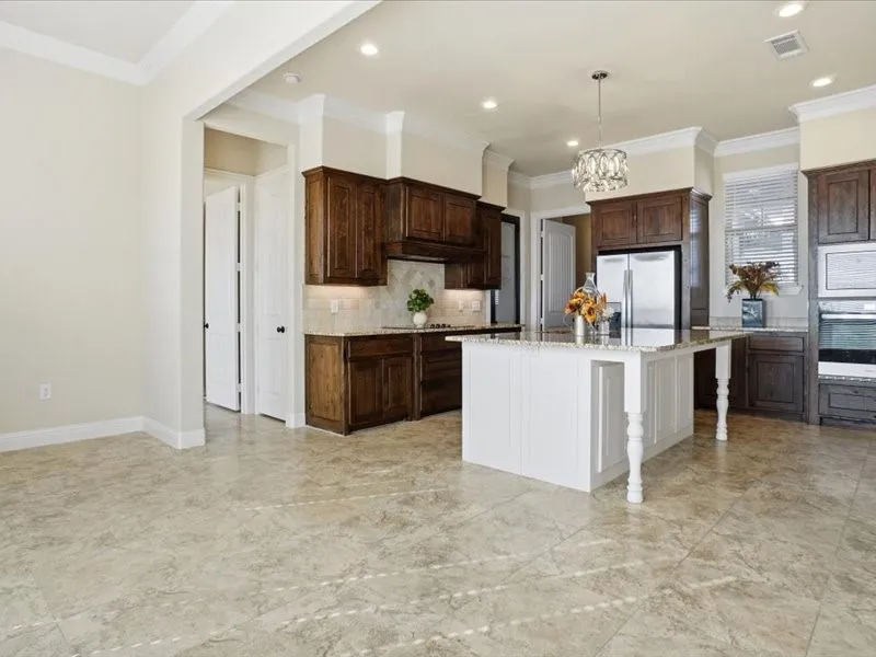 View of kitchen from breakfast area