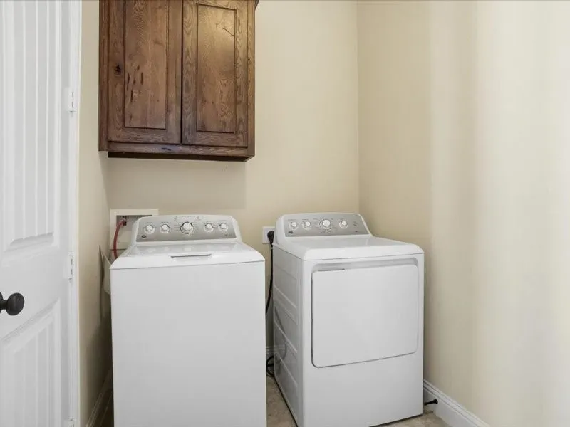 Washer and Dryer Stay and there is a large storage area in Laundry Room