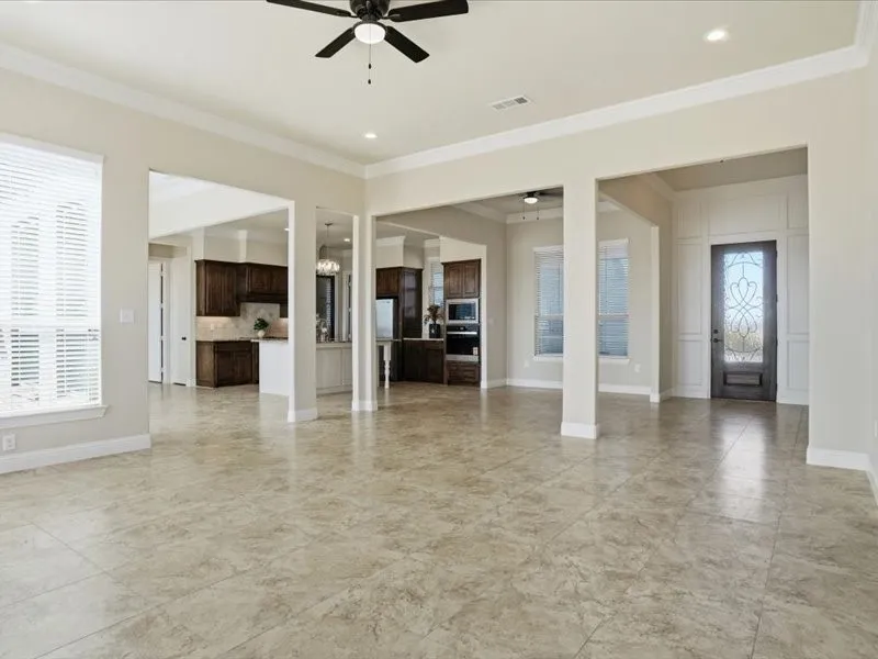 Another view from back patio showing formal ding and kitchen area