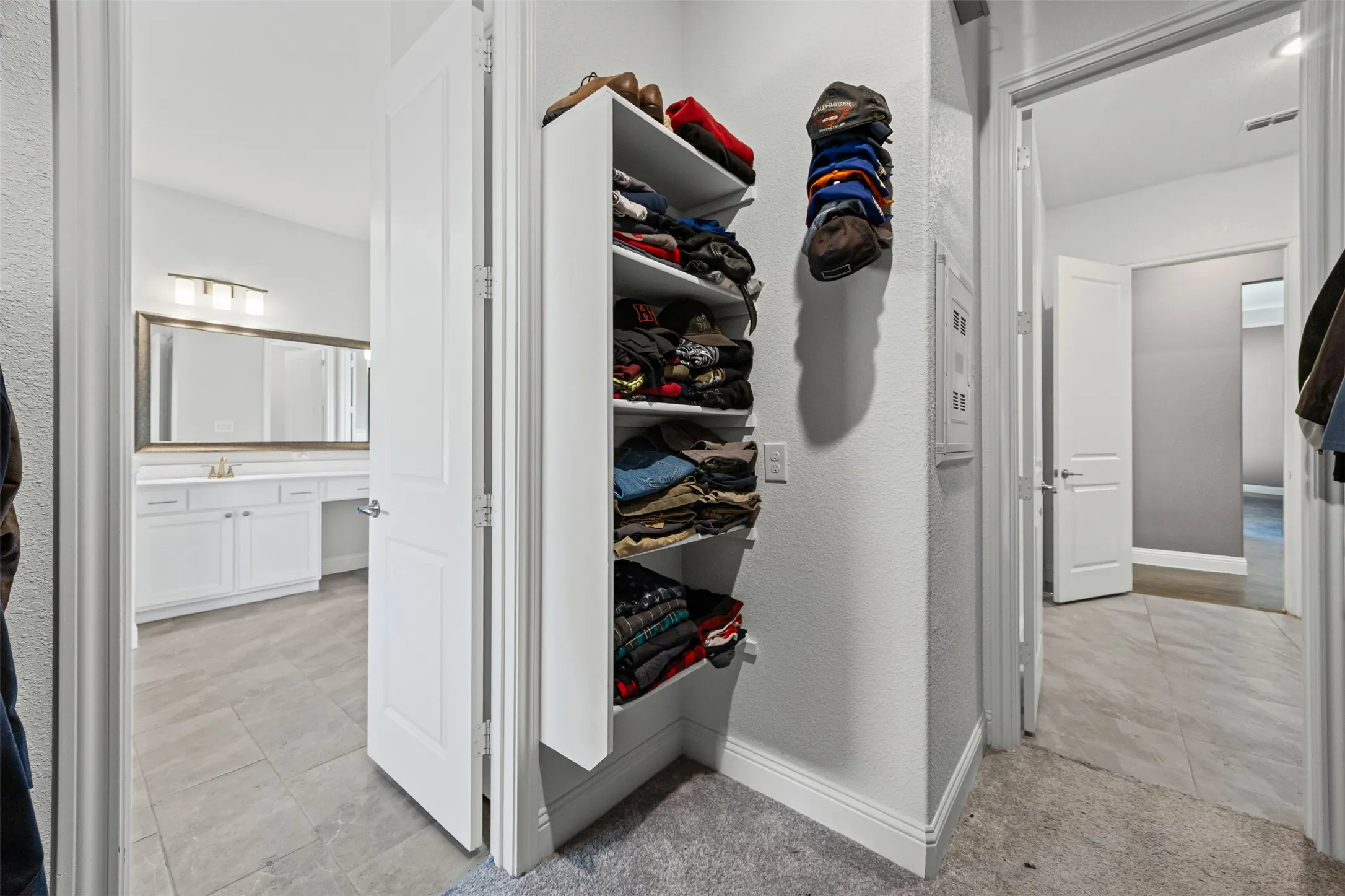 Flow from primary bath to closet to laundry room