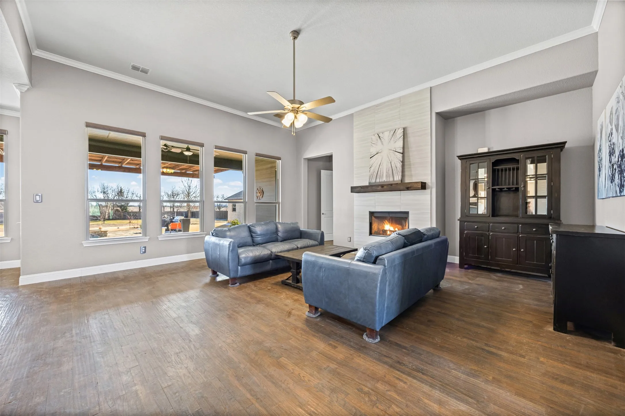 Large windows with backyard view