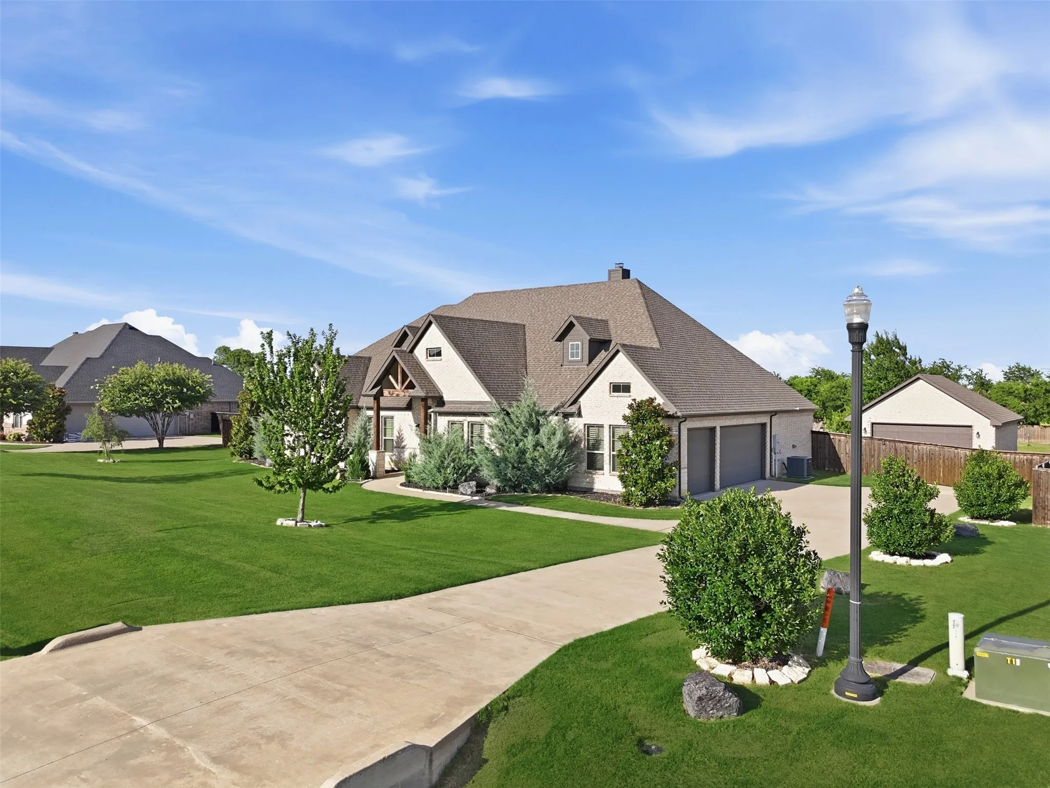 Beautiful home outside Waxahachie city limits with 3-car garage!