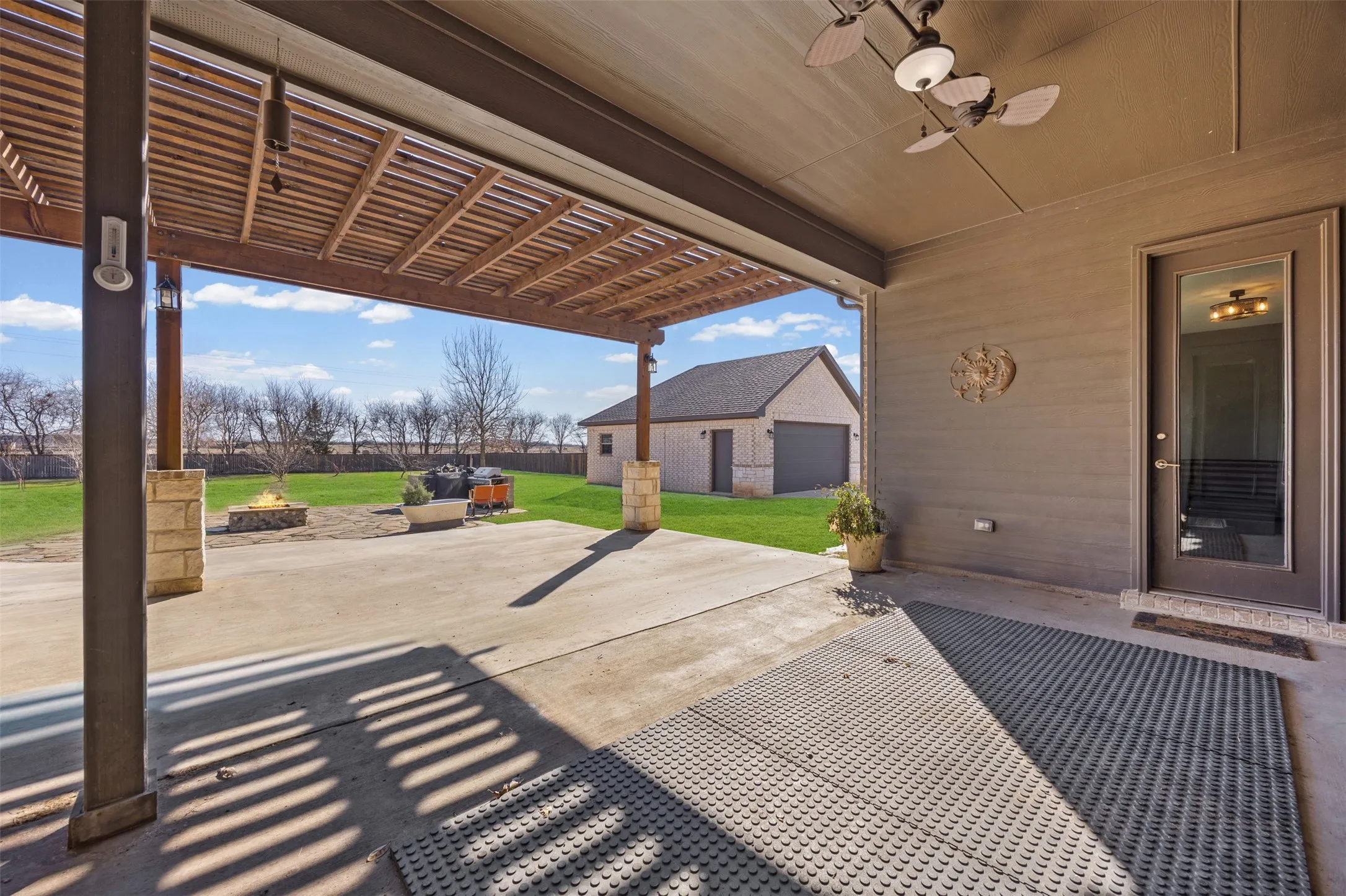 Backyard entrance from flex room