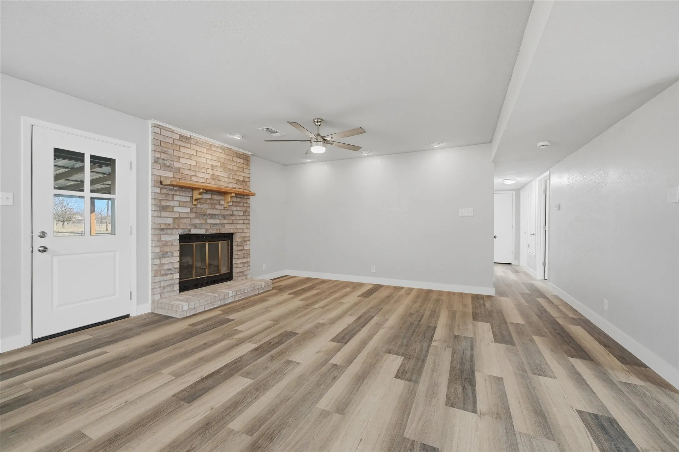 Easy to clean luxury vinyl tile planks throughout the entire home