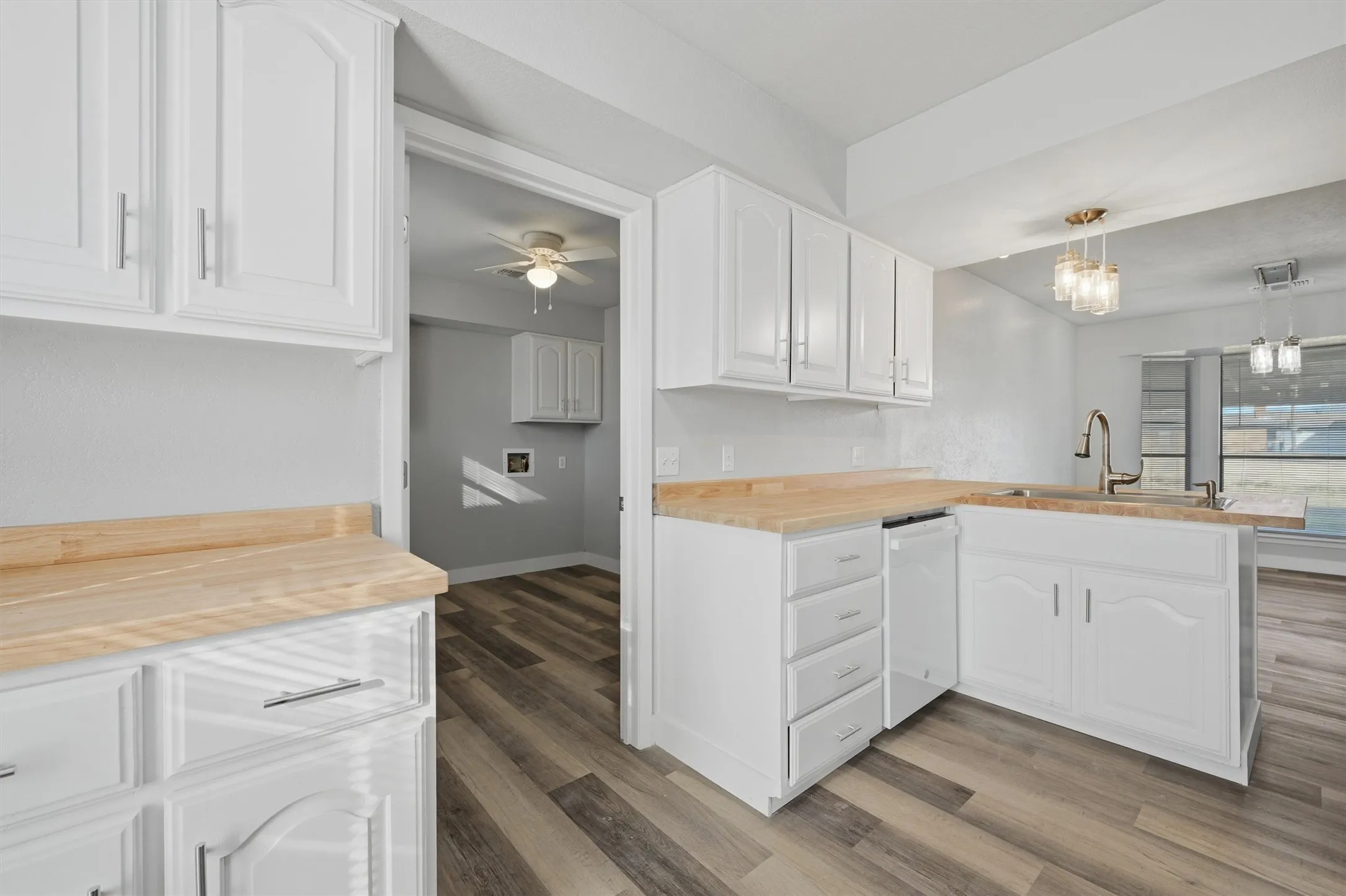 Fresh paint on these solid oak cabinets and new dishwasher