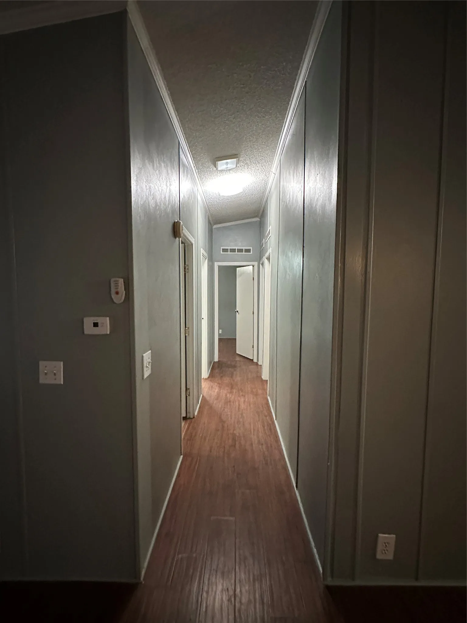 Leads to 2nd Full Bath, Utility Room, 2 bdrms., plus the Bonus Room