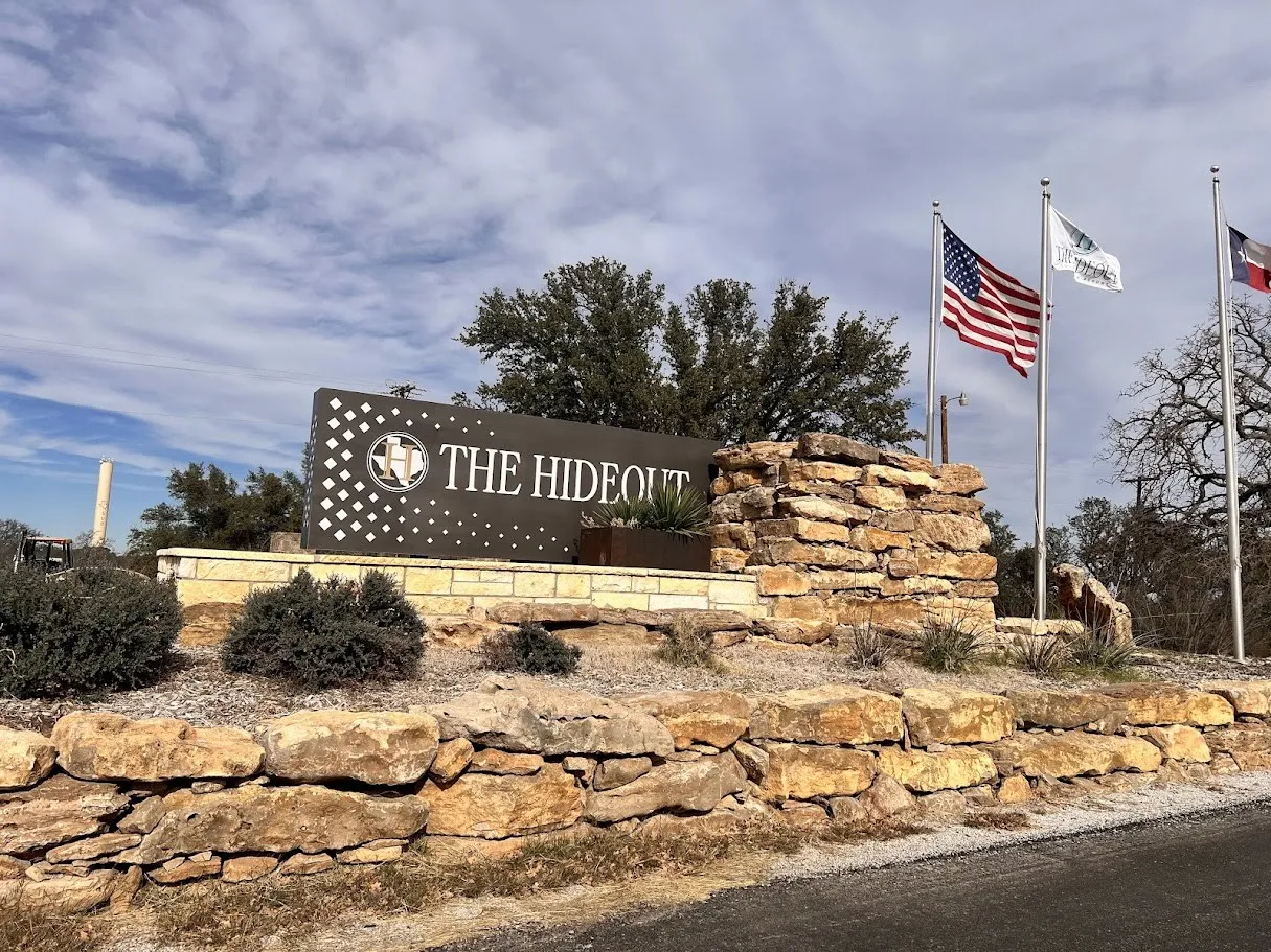 View of community sign- The Hideout