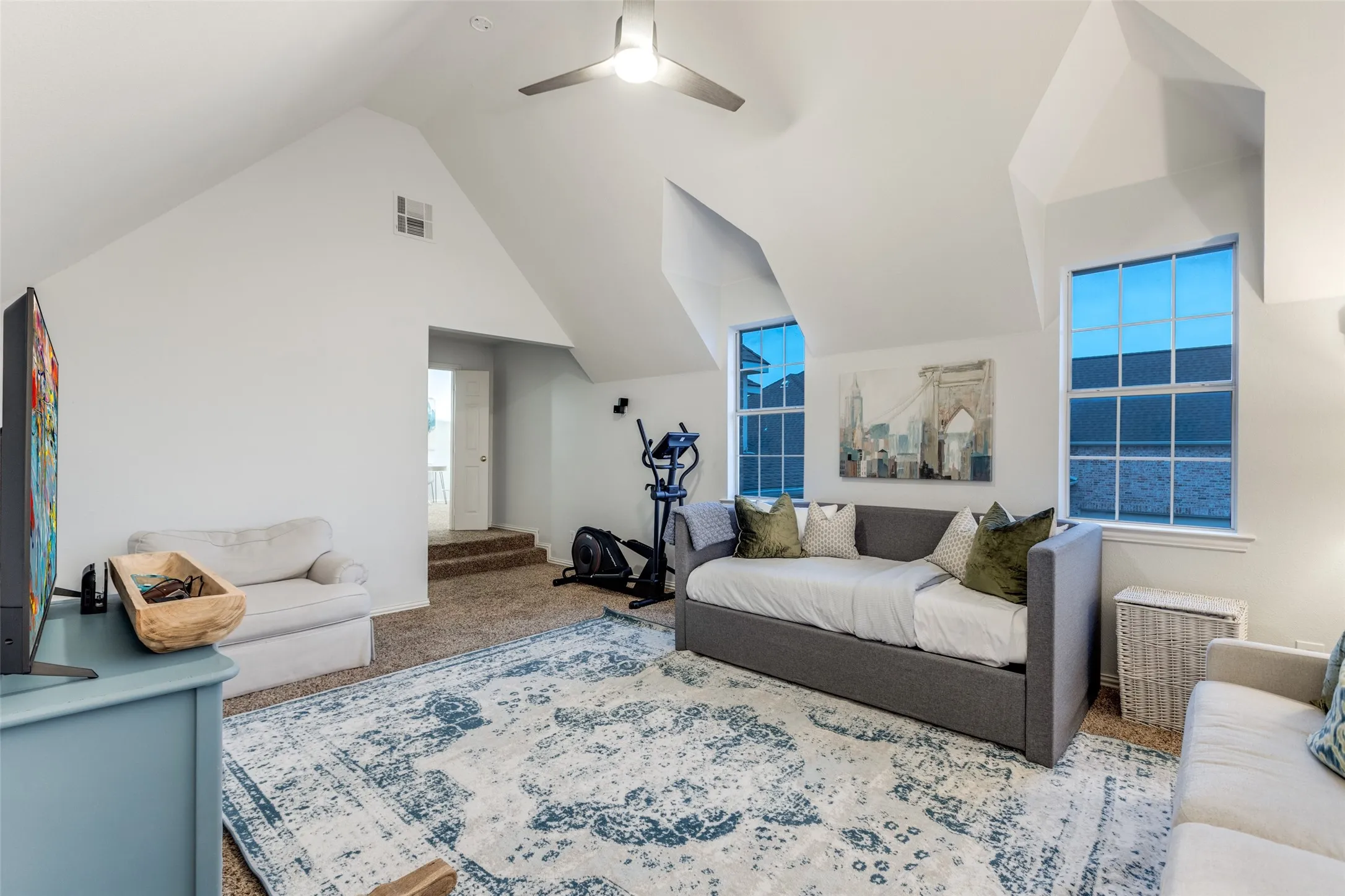 Bonus room with daybed offers flex space