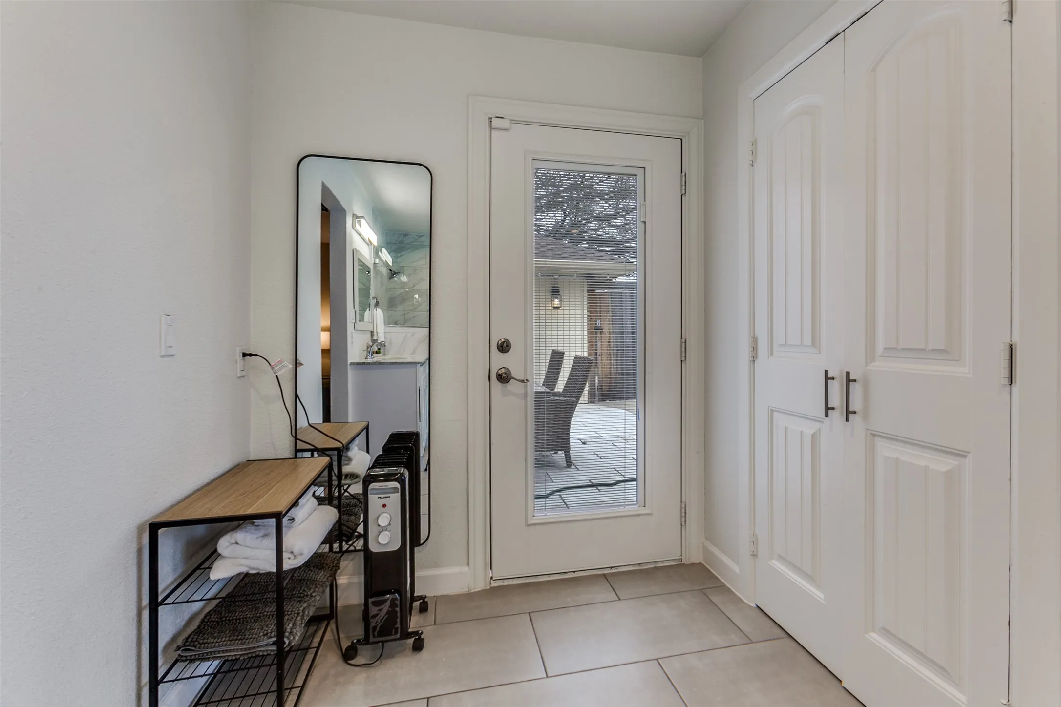 Private door to back patio and pool