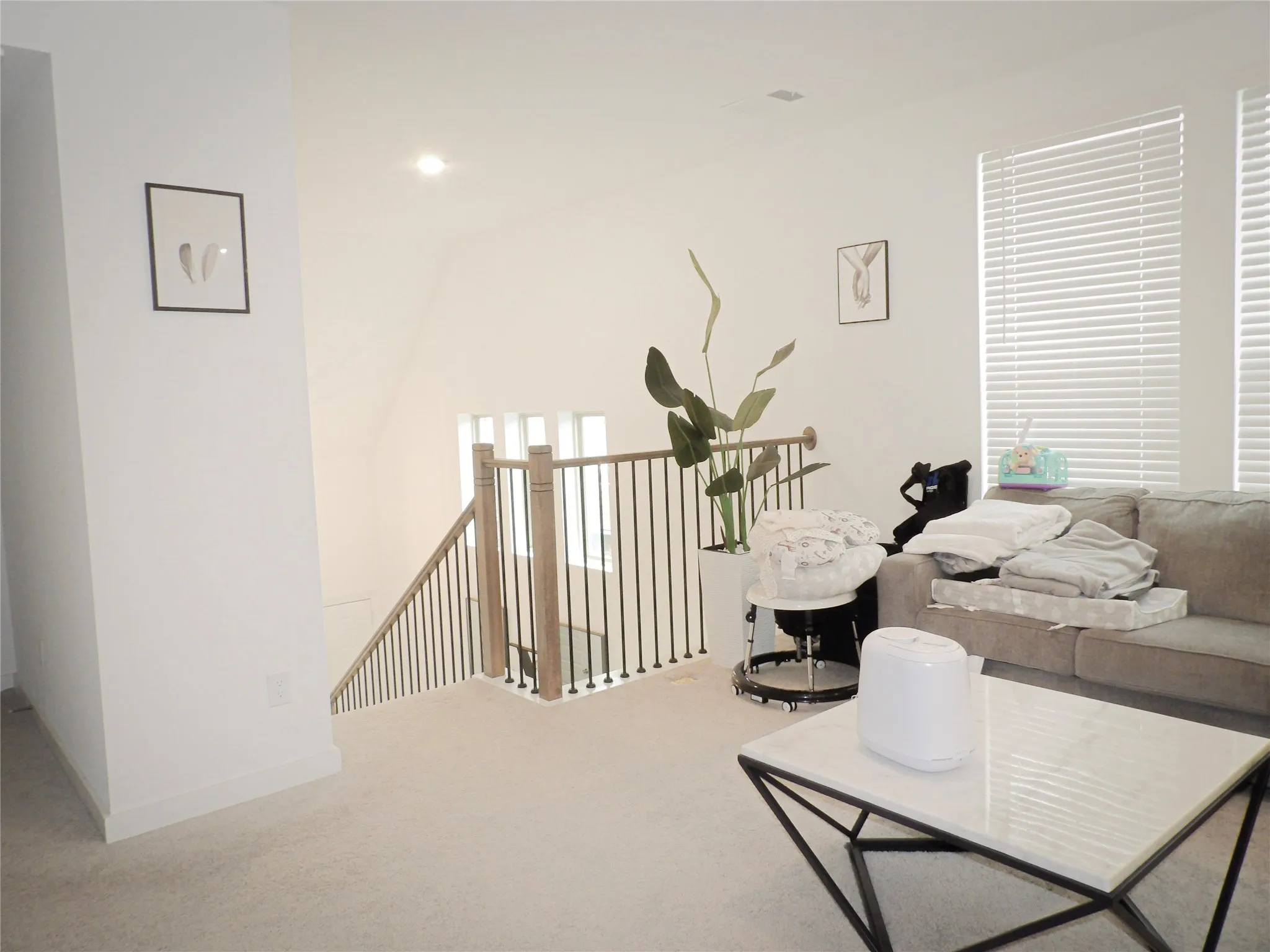 Loft space featuring carpet and recessed lighting