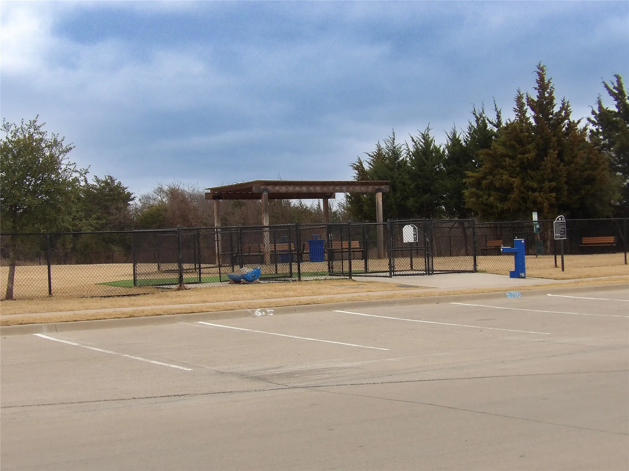 View of community with uncovered parking