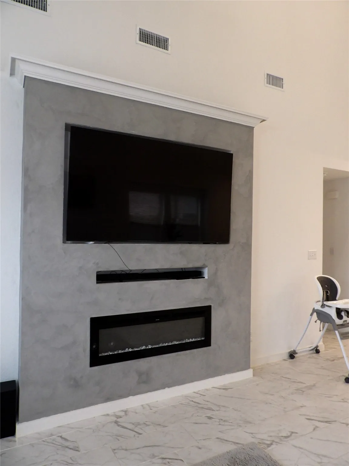 Detailed view of a glass covered fireplace