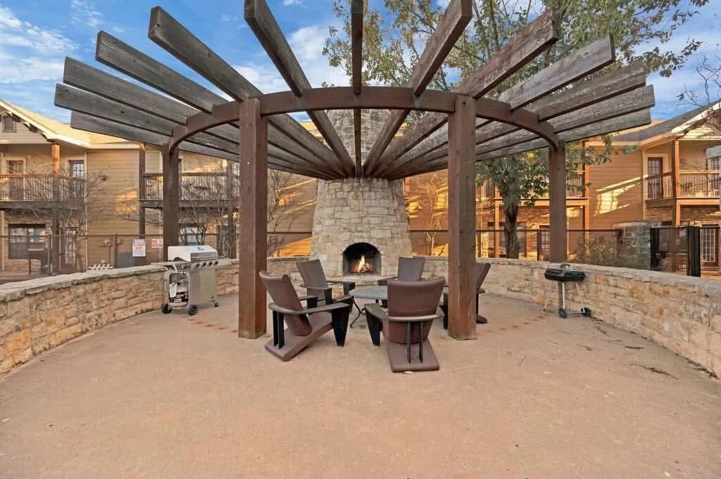 outdoor fireplace in courtyard included as community amenity