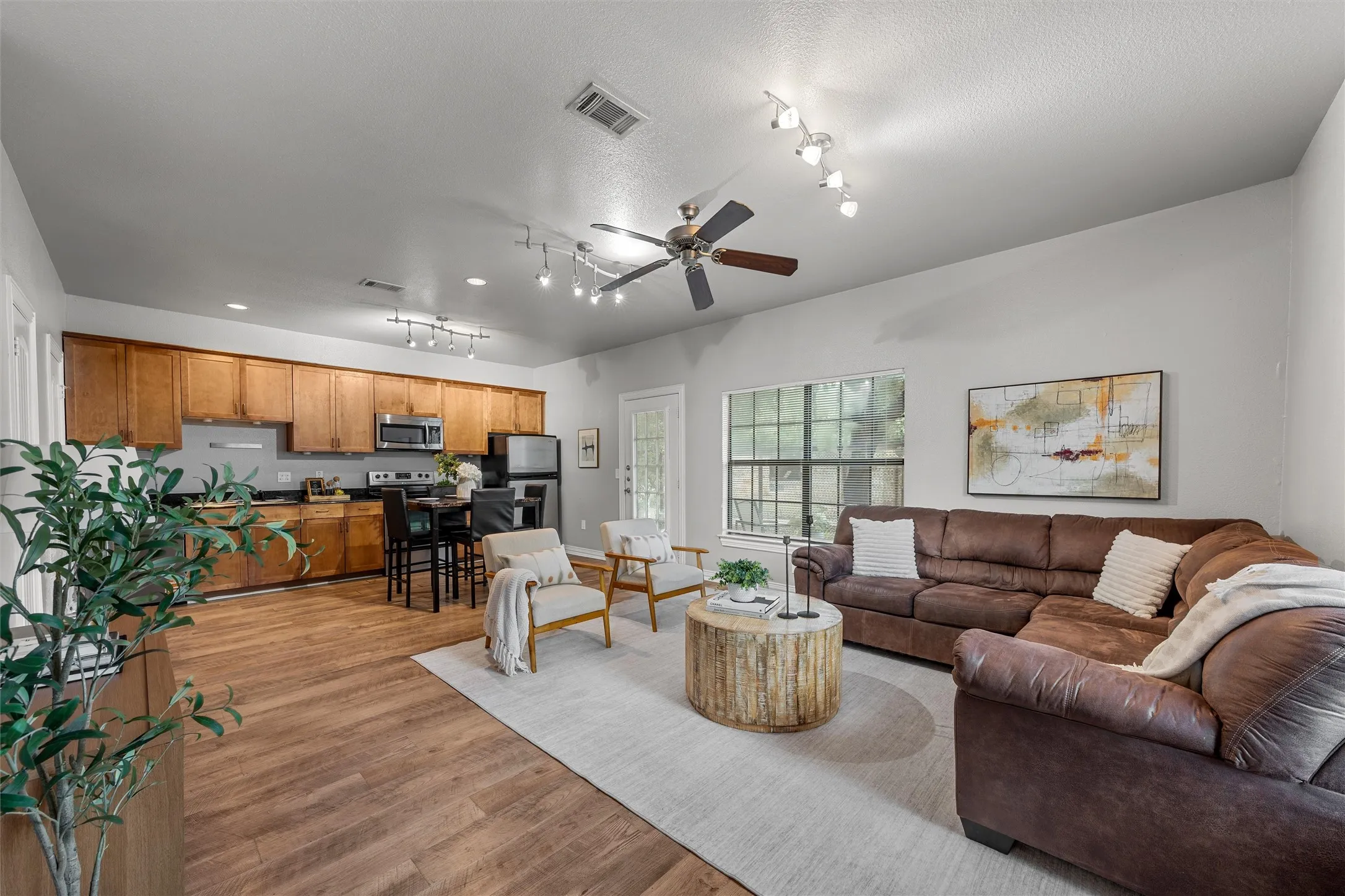 living room open floor plan to kitchen