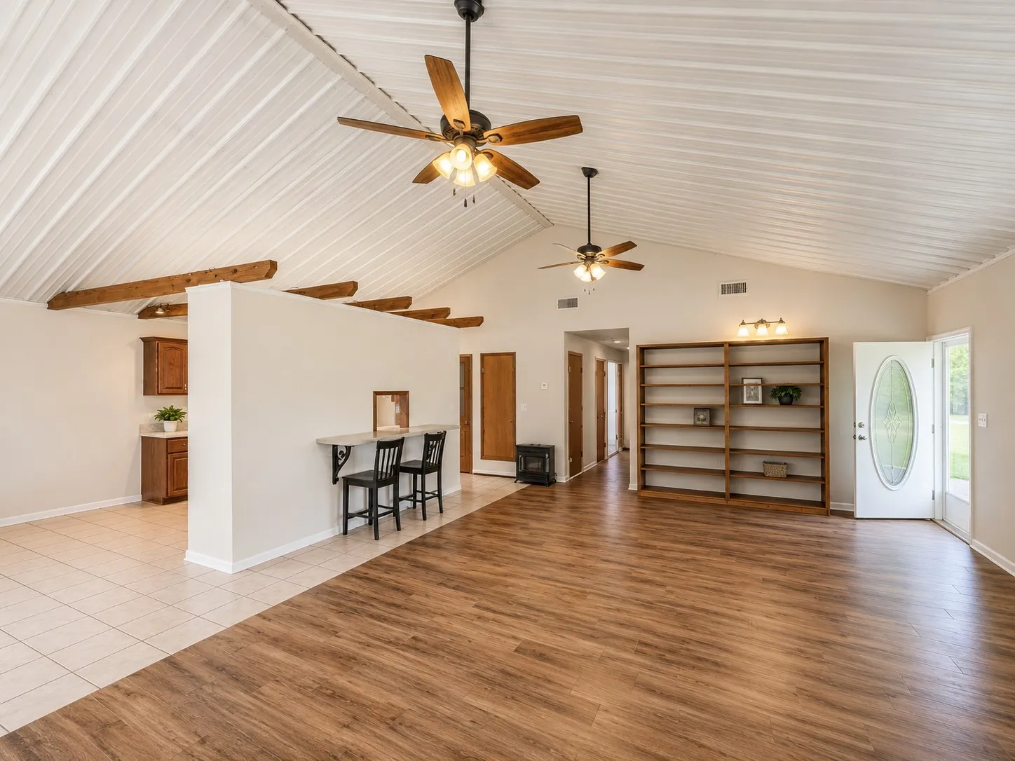 Spacious interior with vaulted ceilings and exposed wood beams