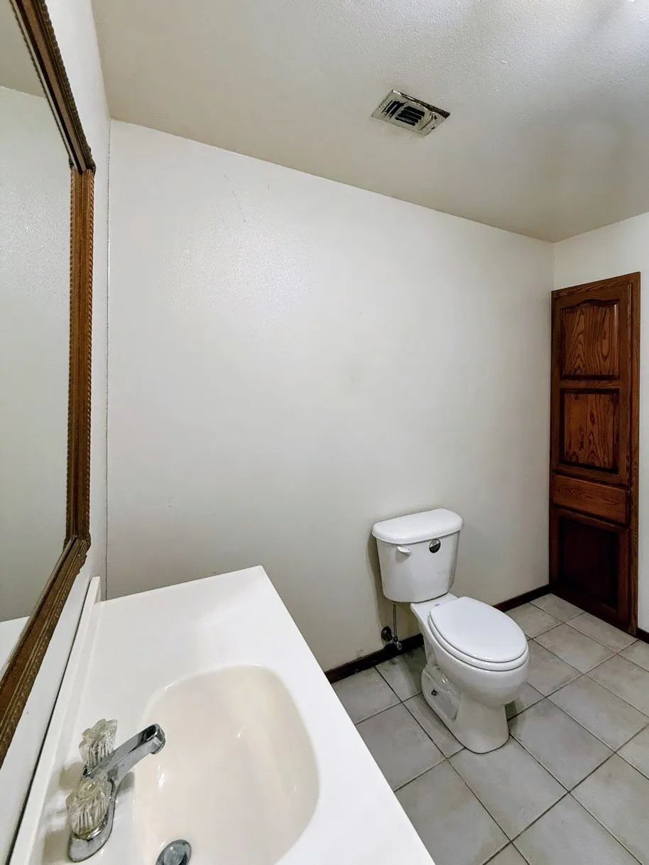 Bathroom with vanity and light tile patterned floors