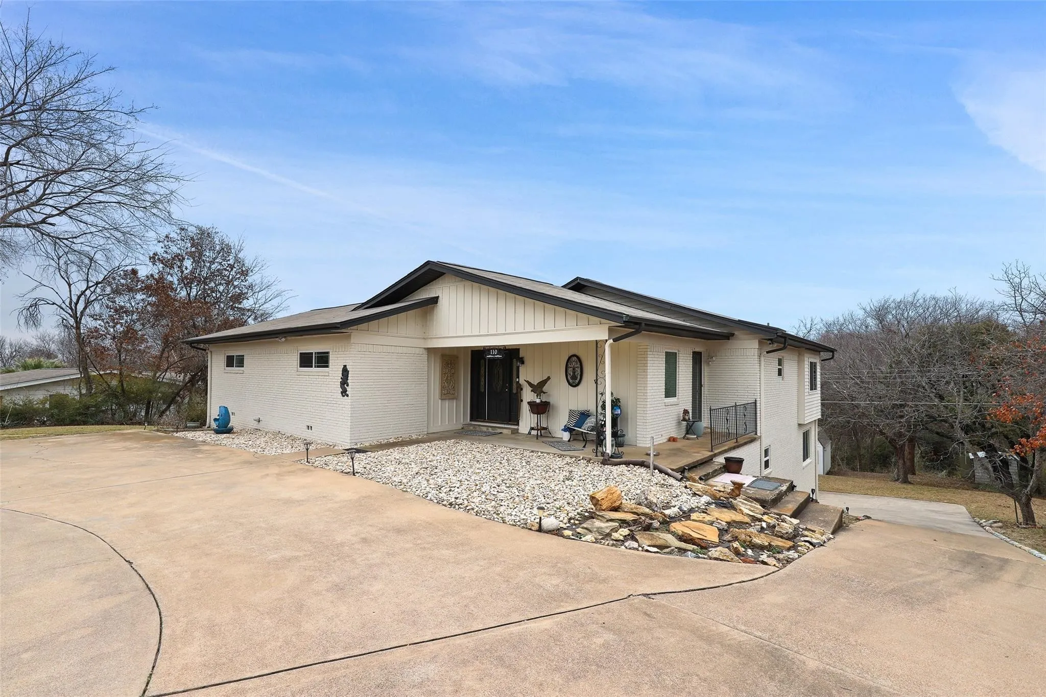 Nestled into this hill, this home is truly one of a kind!