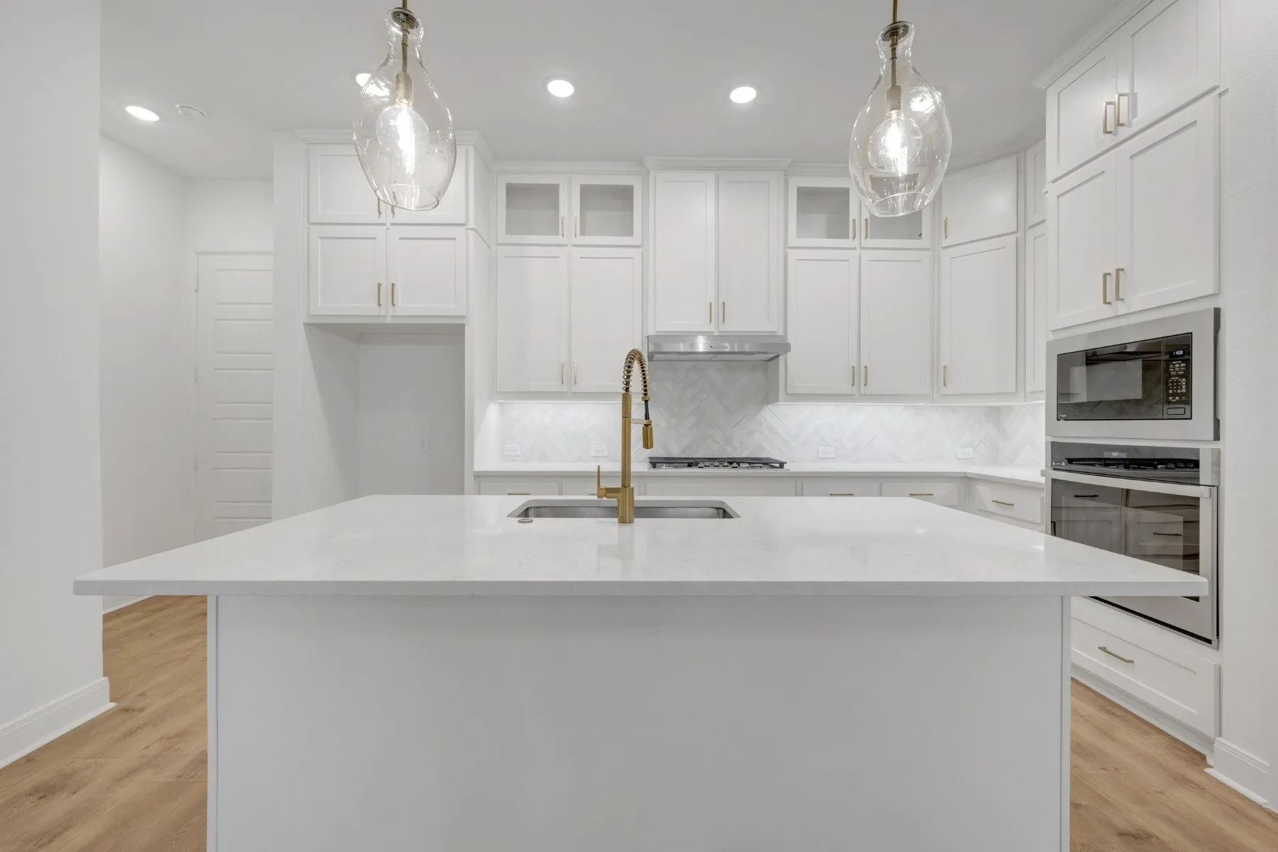 Spacious kitchen island with a light-toned countertop