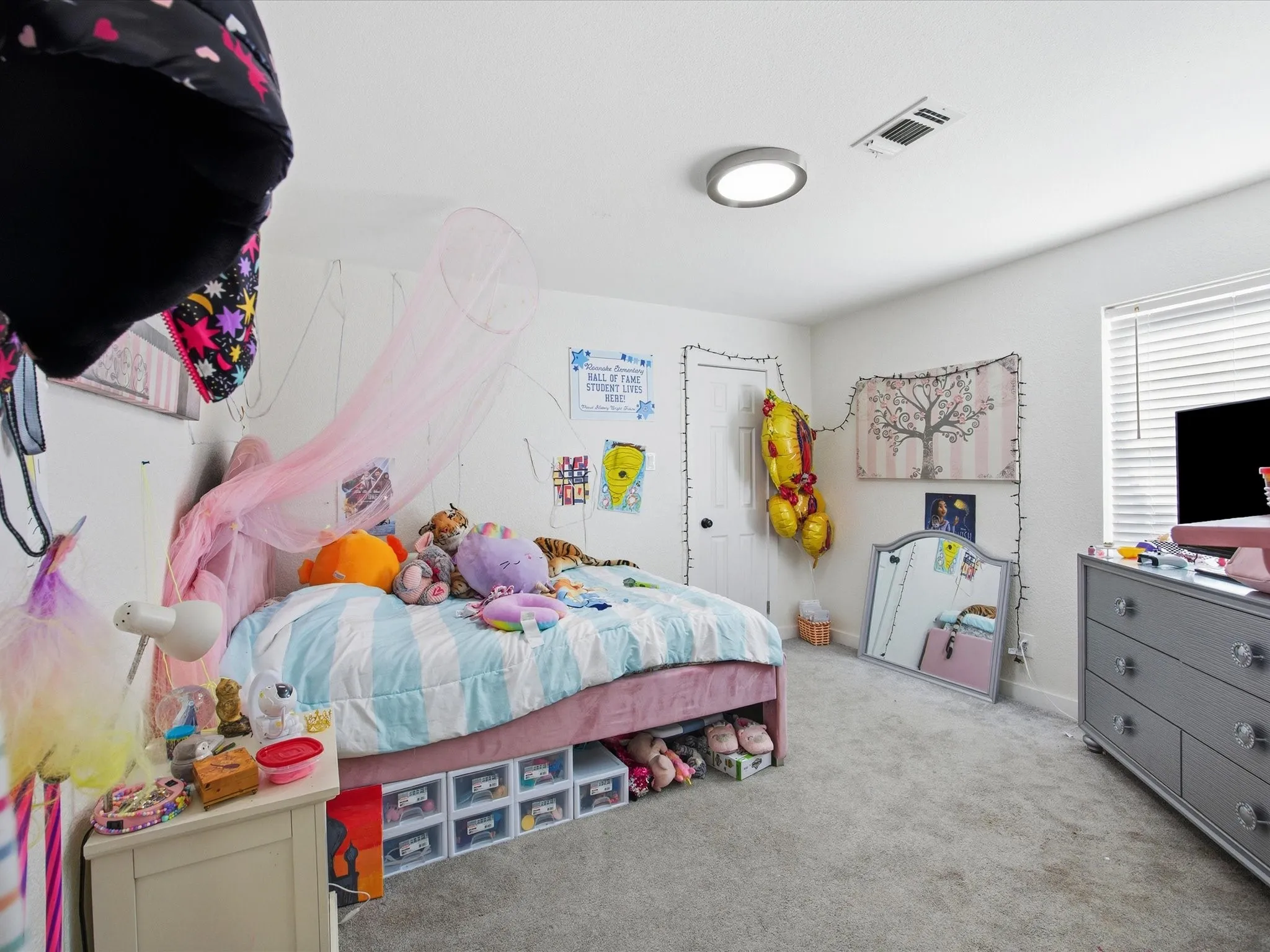 Bedroom with carpet and baseboards