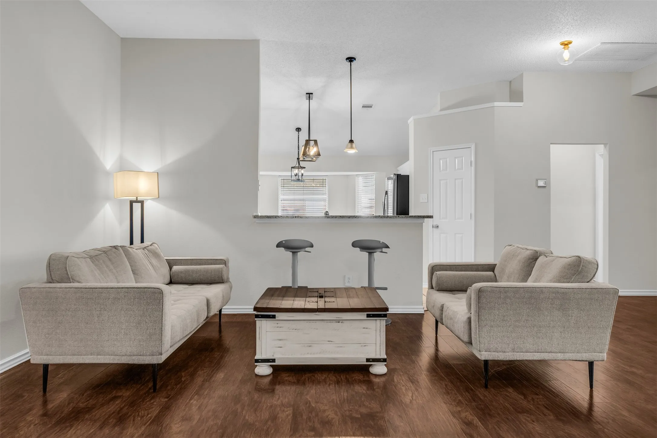 Flexible open layout seamlessly connecting multiple seating areas, perfect for easy entertaining.