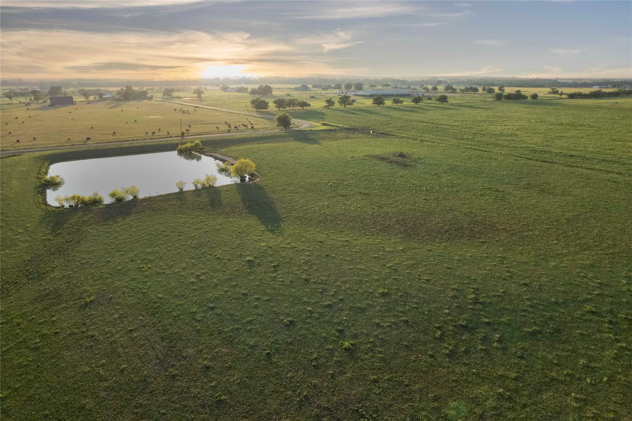 Overview of rural landscape featuring a large body of water