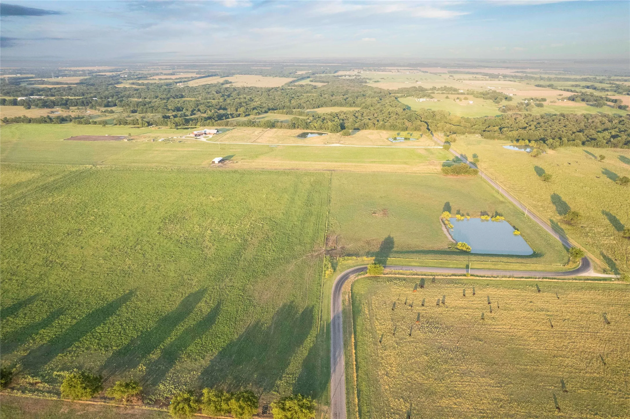 View of rural area with large plots for crops