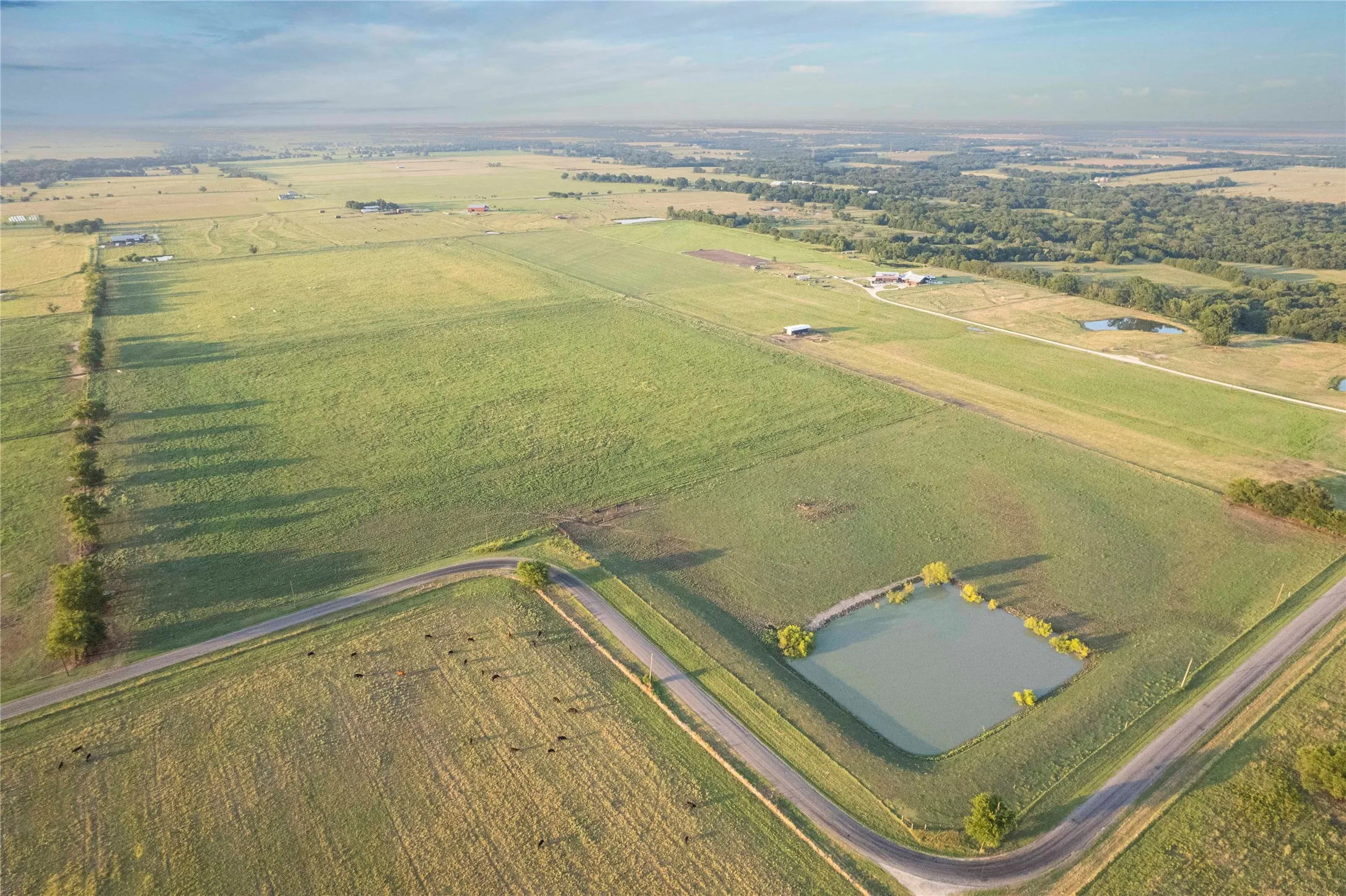 Aerial view of sparsely populated area featuring extensive farmland