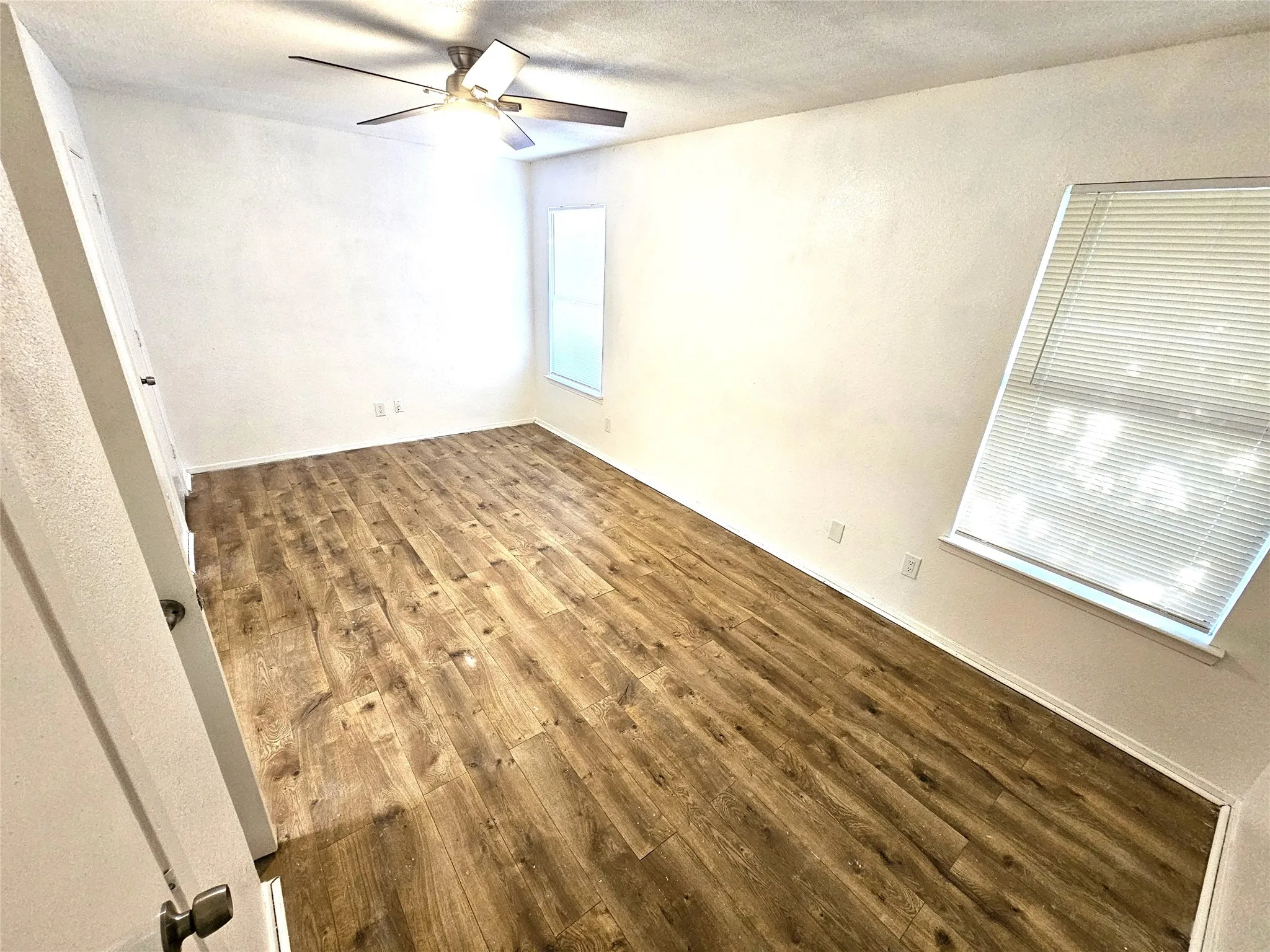 Bedroom#2-Another good size bedroom (13x13) with new ceiling fan & new wood laminate floor. And with double closets as well.