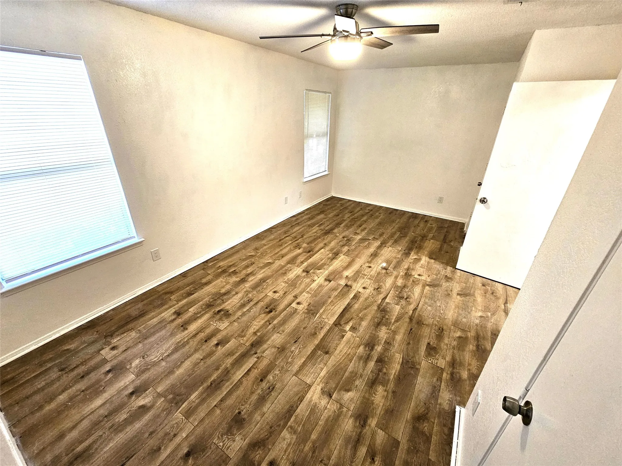 Bedroom#2-Another good size bedroom (13x13) with new ceiling fan & new wood laminate floor. And with double closets as well.